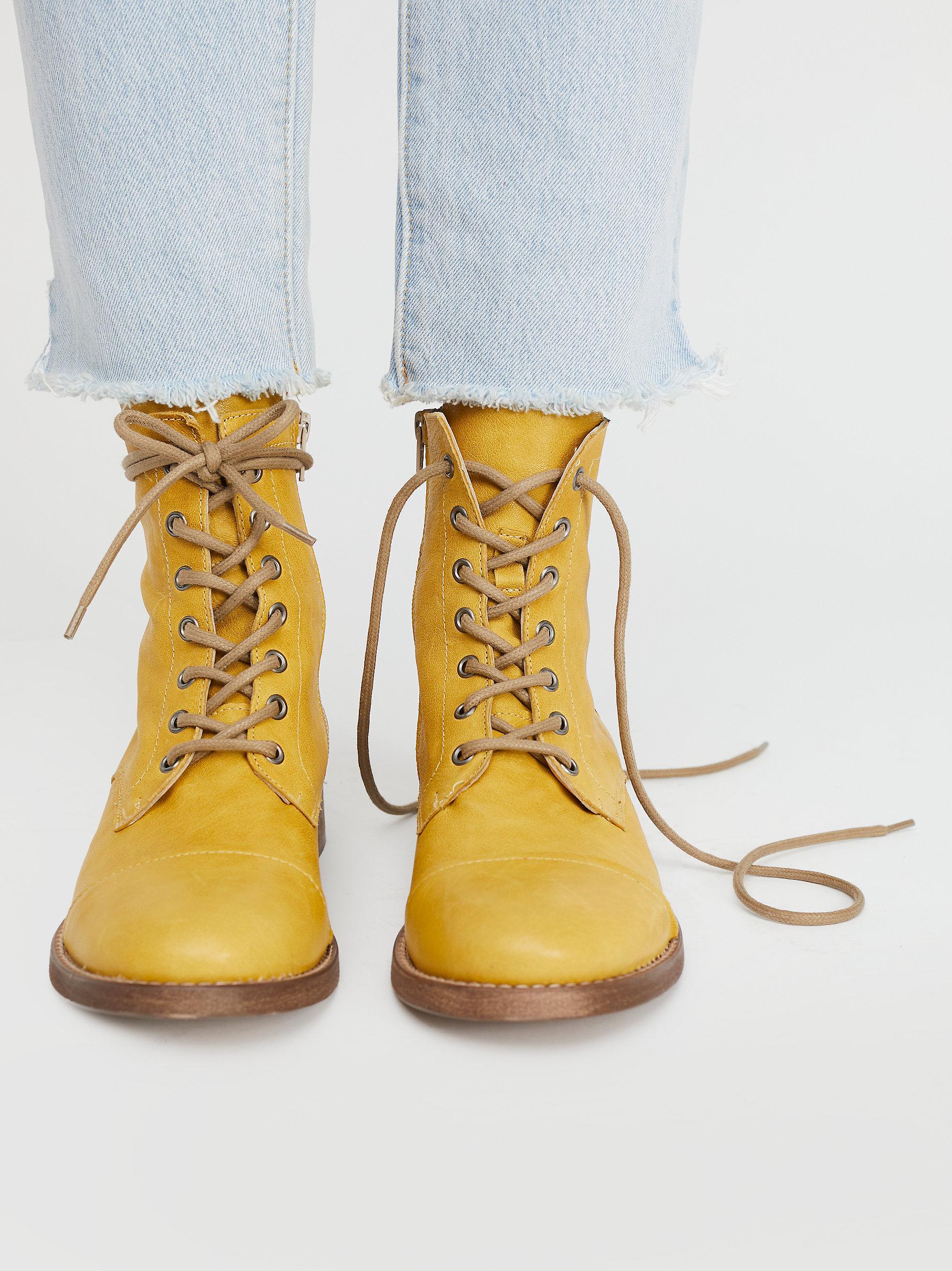yellow lace up boots