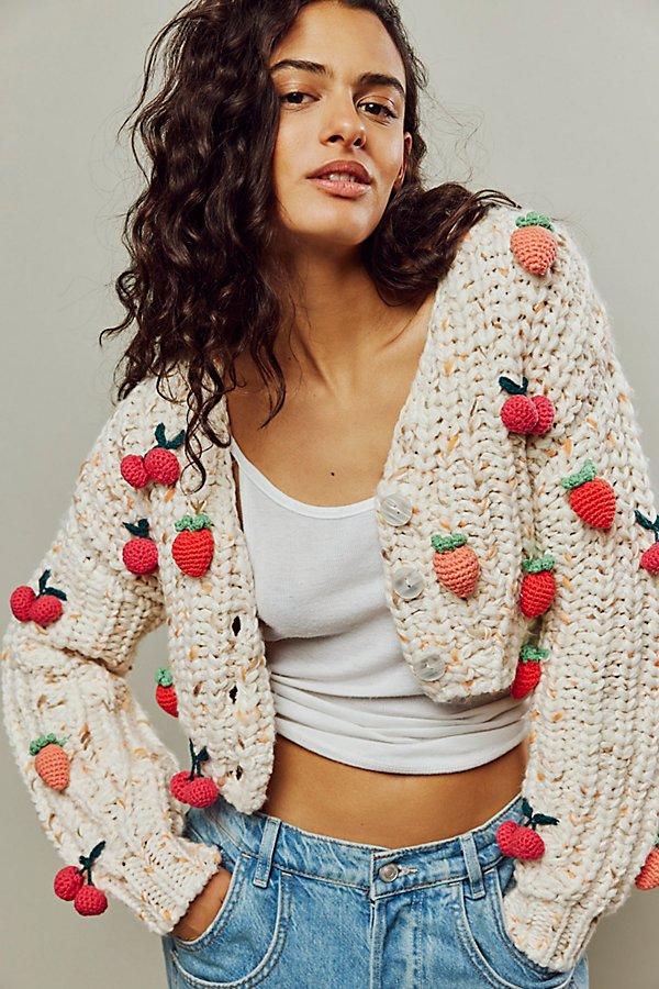 Cardigan with store pom poms