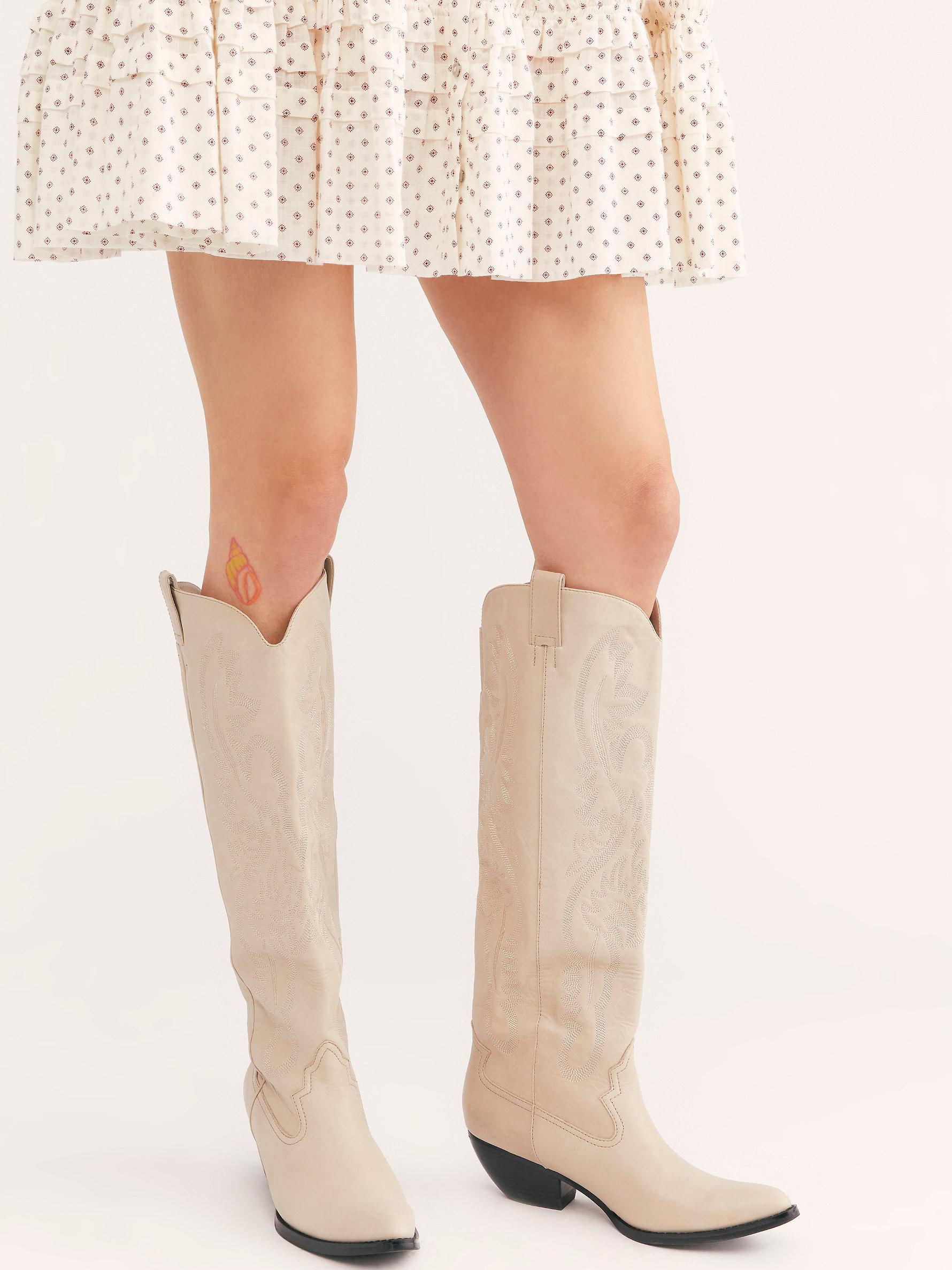 white tall western boots
