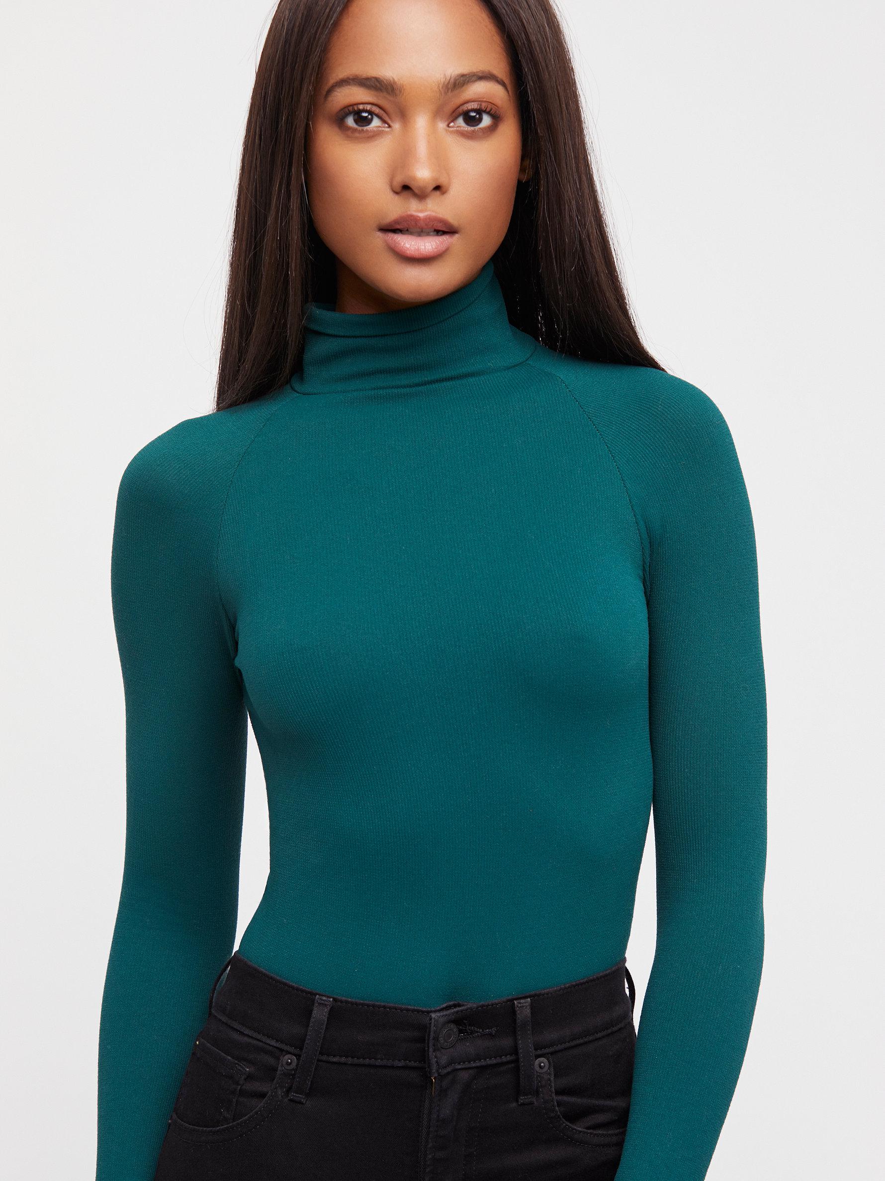 green turtleneck bodysuit