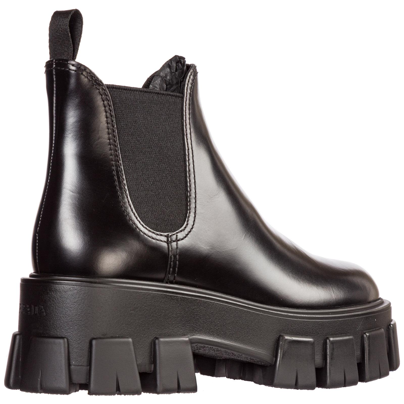 Prada Women's Leather Heel Ankle Boots Booties Monolith in Nero (Black) |  Lyst