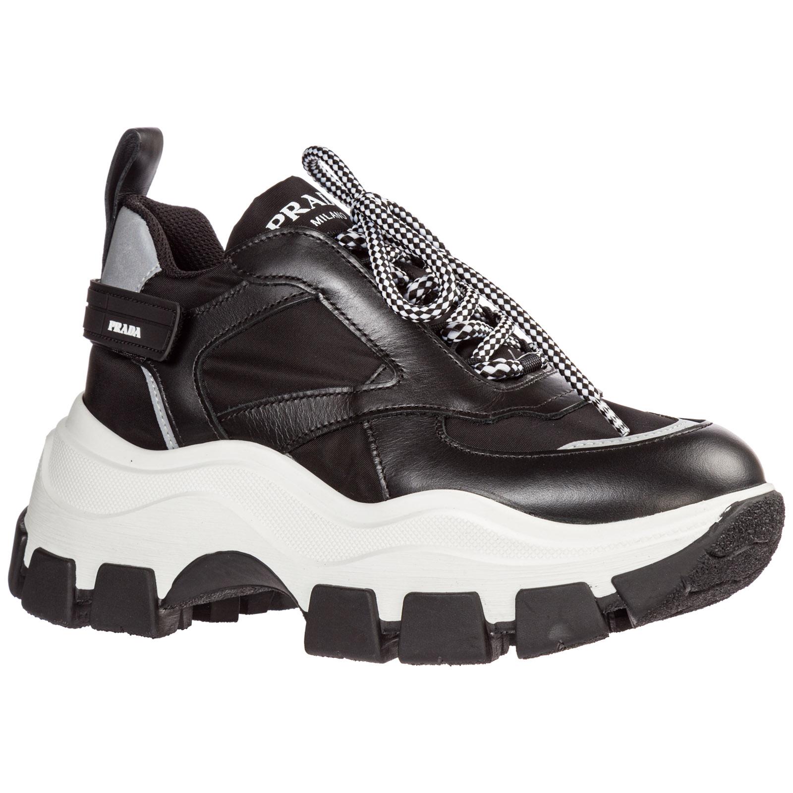 black shiny prada trainers