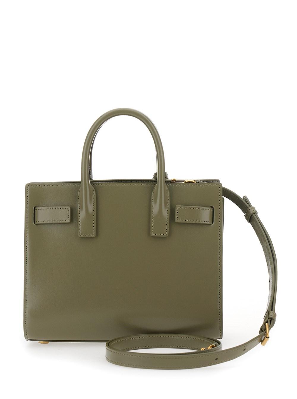 Women's Saint Laurent Top-handle bags | Lyst