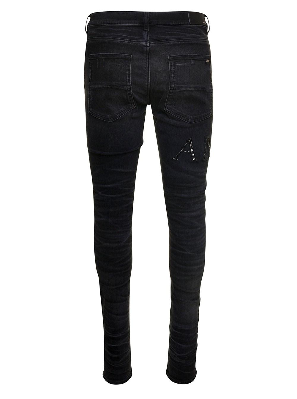 Amiri Skinny Jeans With Crystal Embellished Logo And Used Effect