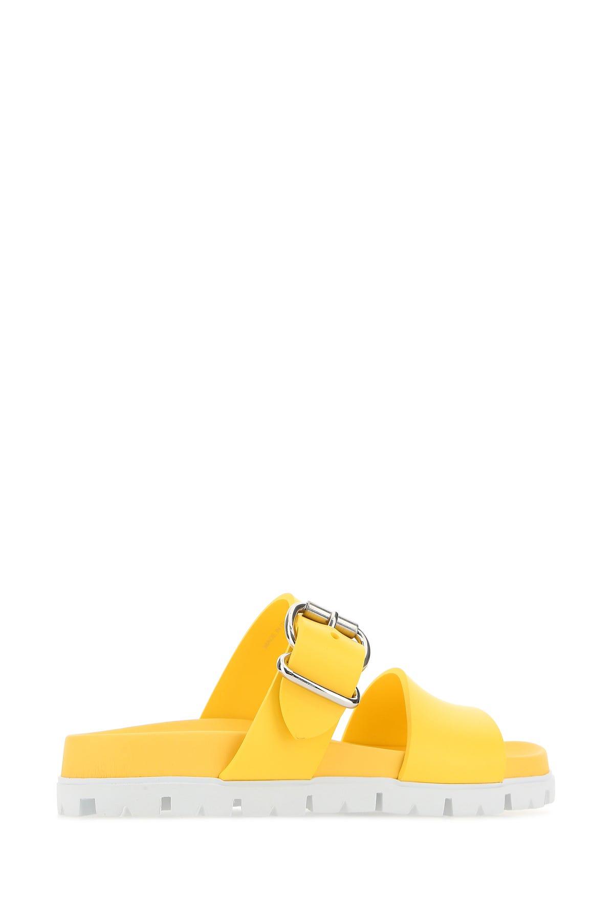 Prada Slippers in Yellow | Lyst