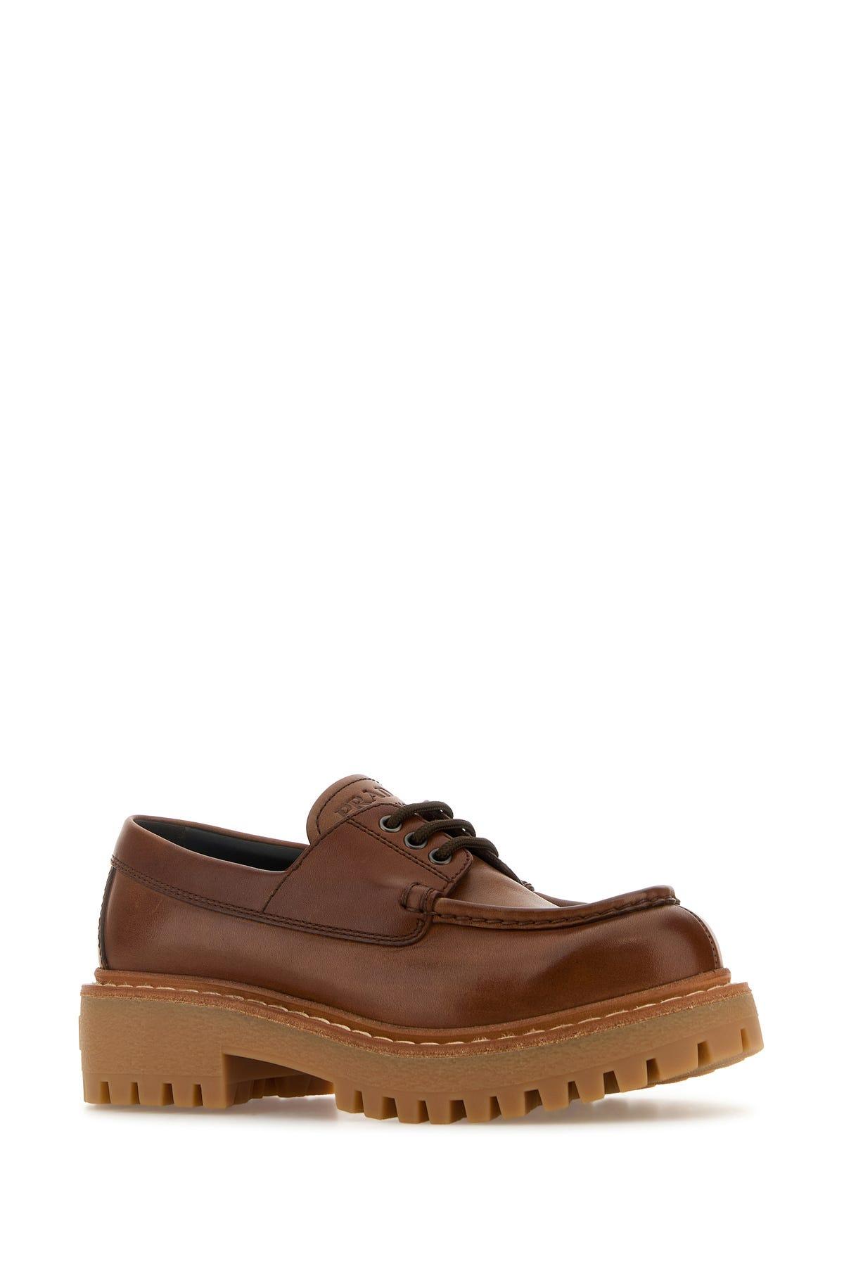 Prada Lace-Ups in Brown Lyst
