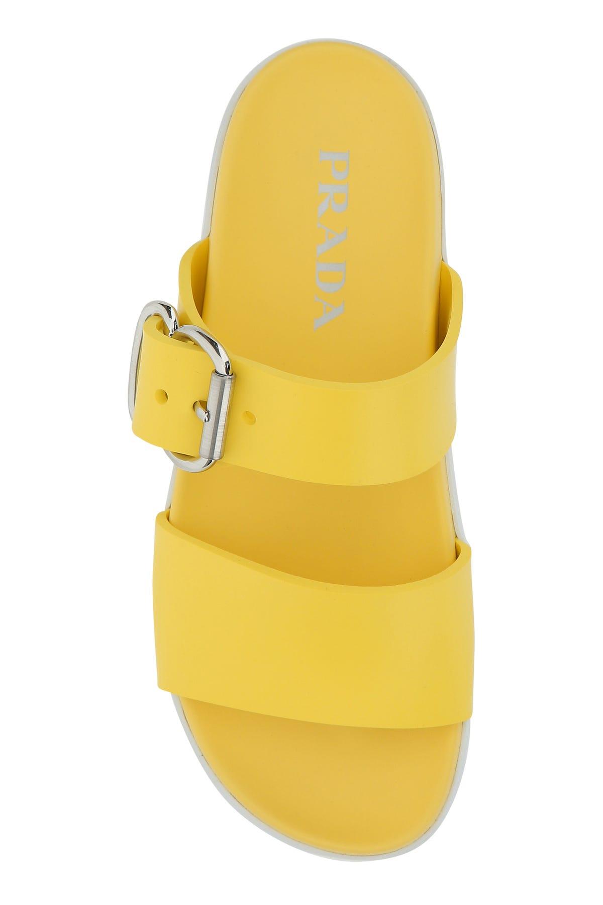 Prada Slippers in Yellow | Lyst
