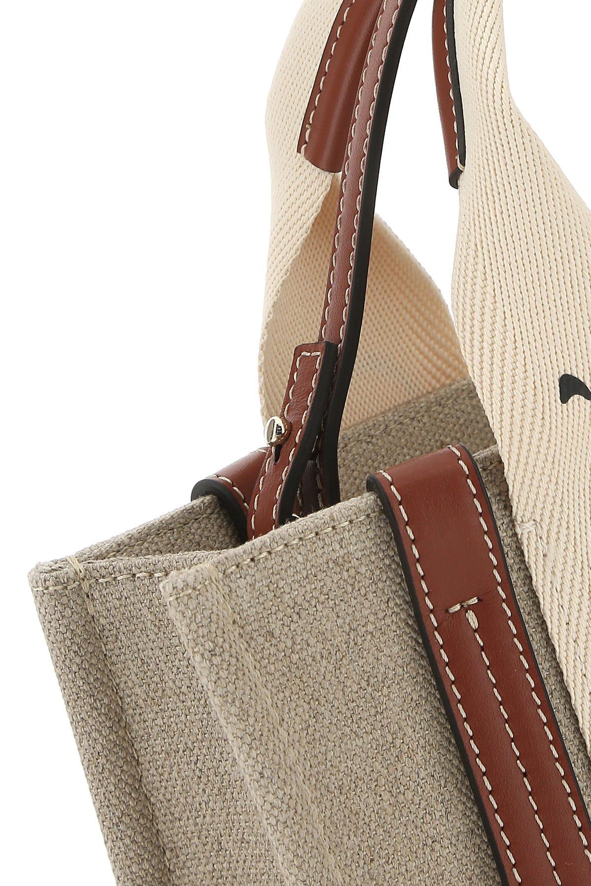 + NET SUSTAIN Woody small embroidered leather-trimmed linen tote