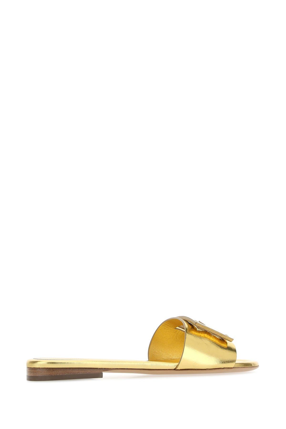 Fendi Gold Nappa Leather Slippers in Metallic | Lyst