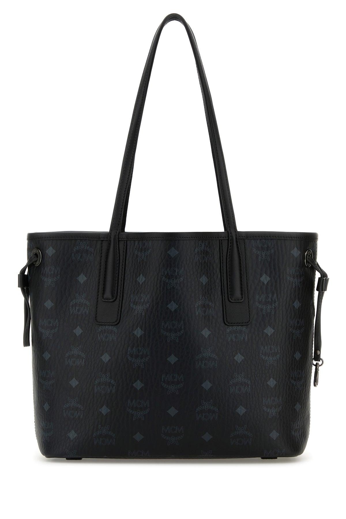 MCM Handbags in Black | Lyst