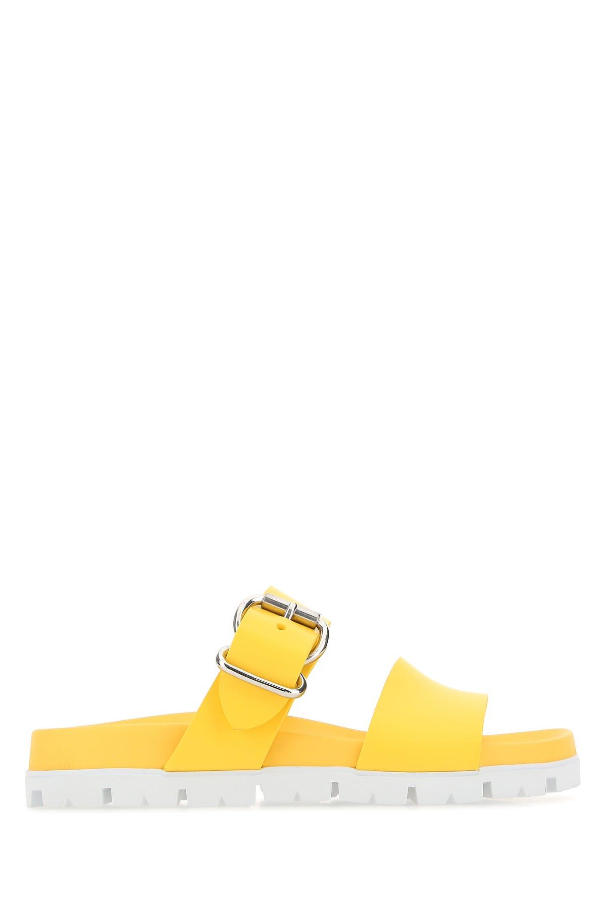 Prada Slippers in Yellow | Lyst
