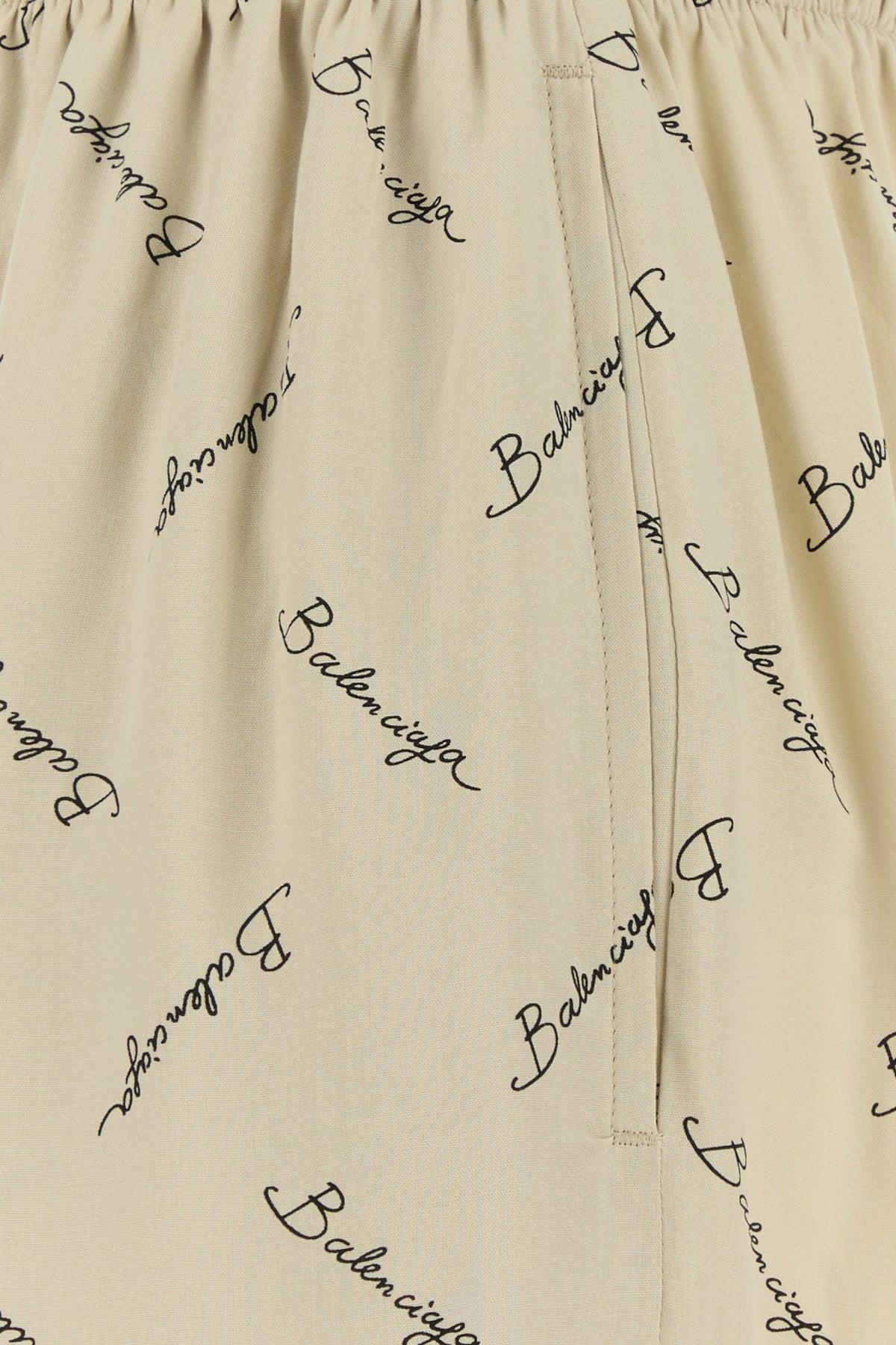 パンツ Balenciaga Printed Viscose Pyjama Pant Balenciaga Pyjama Pant in Light Beige & Black | FWRD