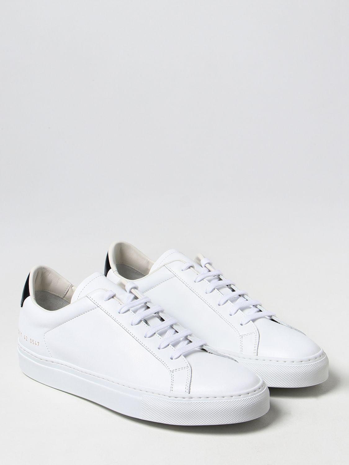 white sneakers common projects