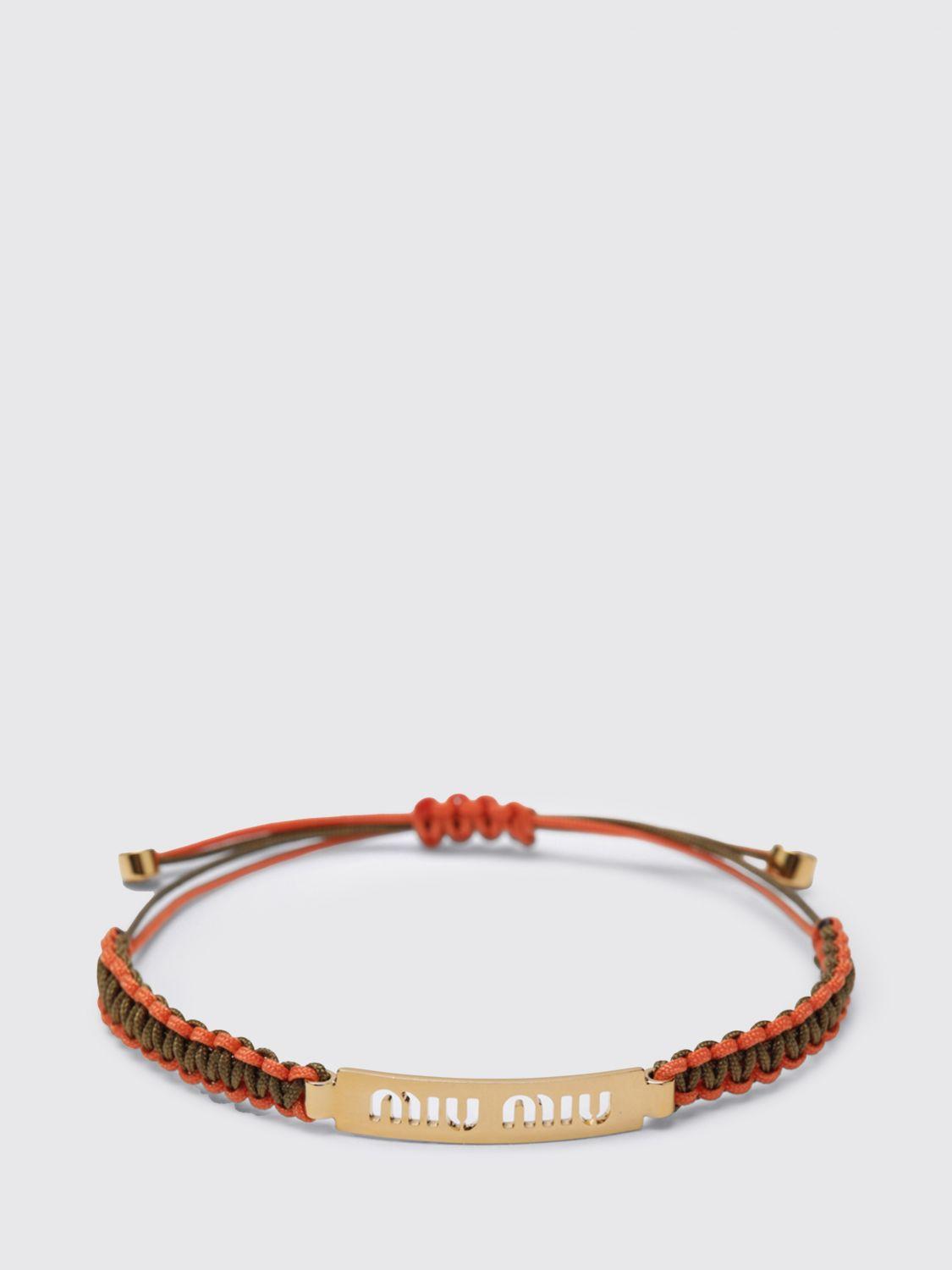 miu-miu-Yellow-Gold-Jewel.jpeg