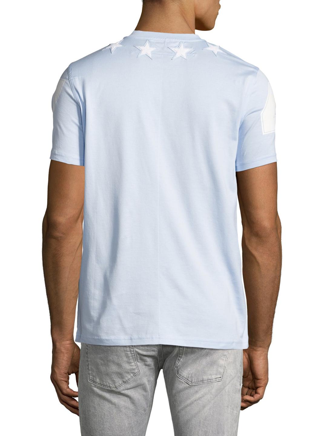 light blue givenchy polo