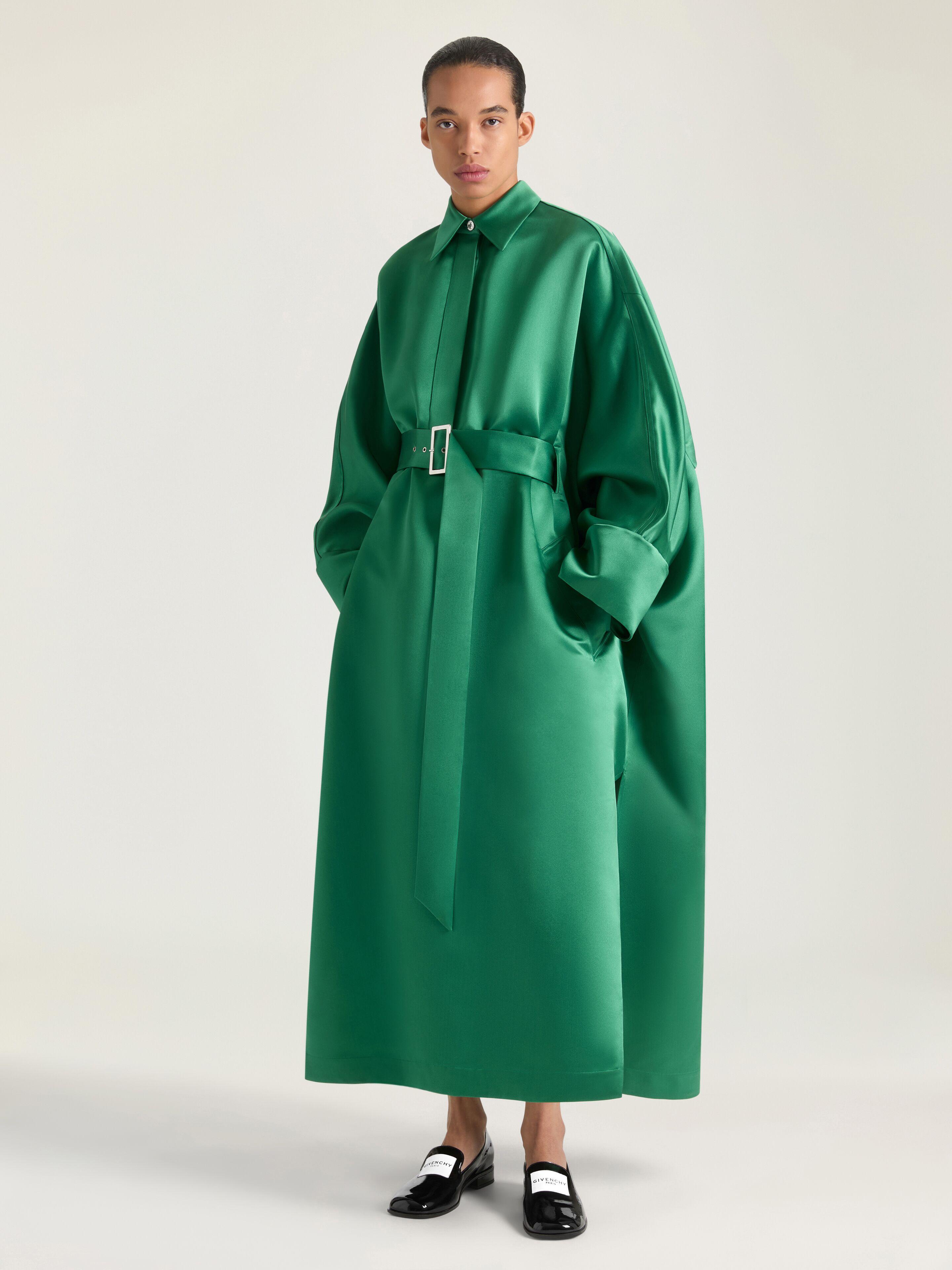 givenchy green dress Athiec wears the sliced mini dress in emerald green silk satin duchesse with bold crystal earrings from the Spring 2026 collection. Givenchy by Sarah Burton Model @athiec_geng Photographer @hellmannsam Makeup @christellecocquet Hair @
