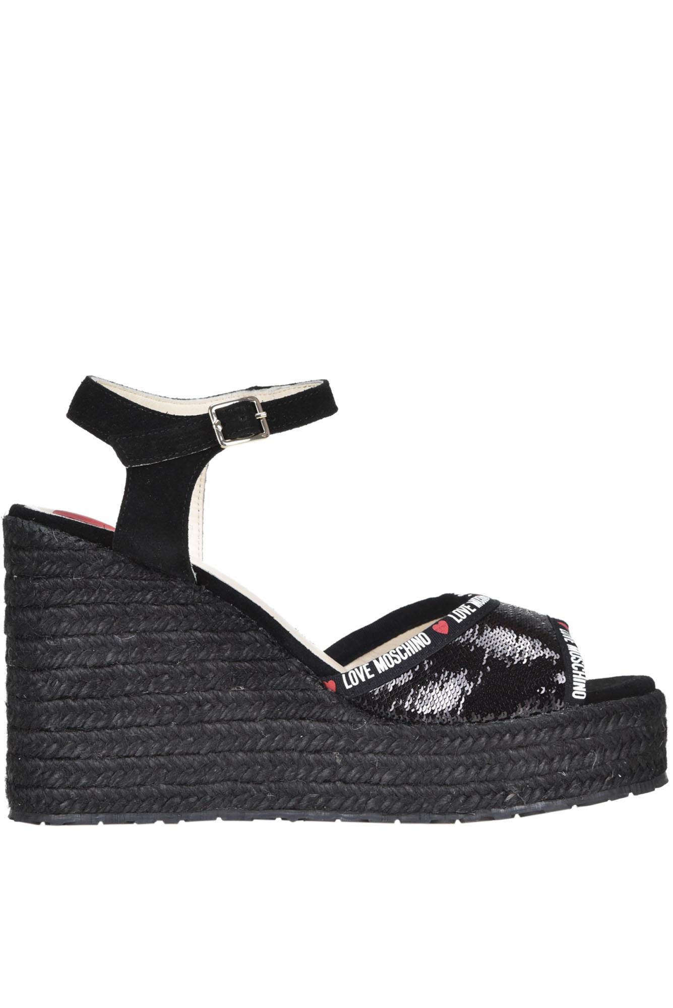 Sandali con zeppaLove Moschino in Pelle scamosciata di colore Nero | Lyst