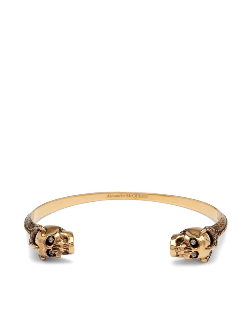 Alexander mcqueen twin skull hotsell bracelet