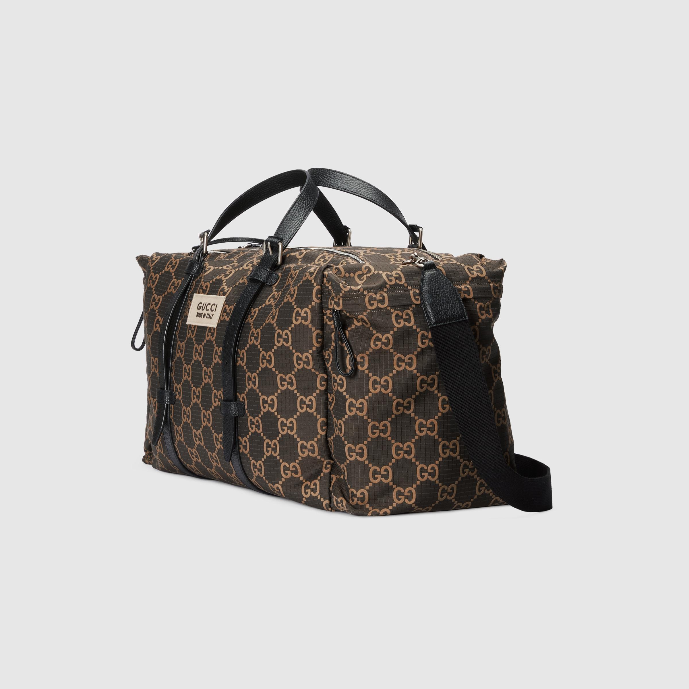 Gucci Maxi GG Polyester Duffle Bag in Brown for Men | Lyst