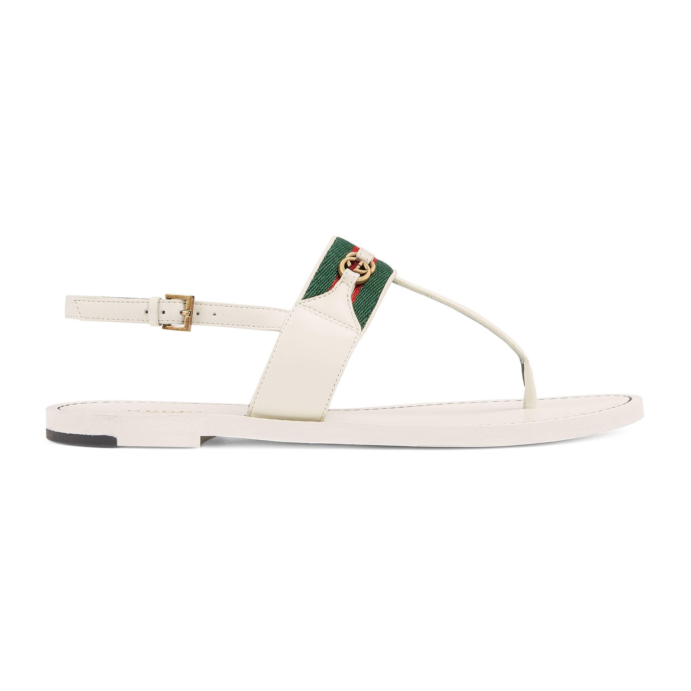 Buy > gucci web & leather thong sandals > in stock