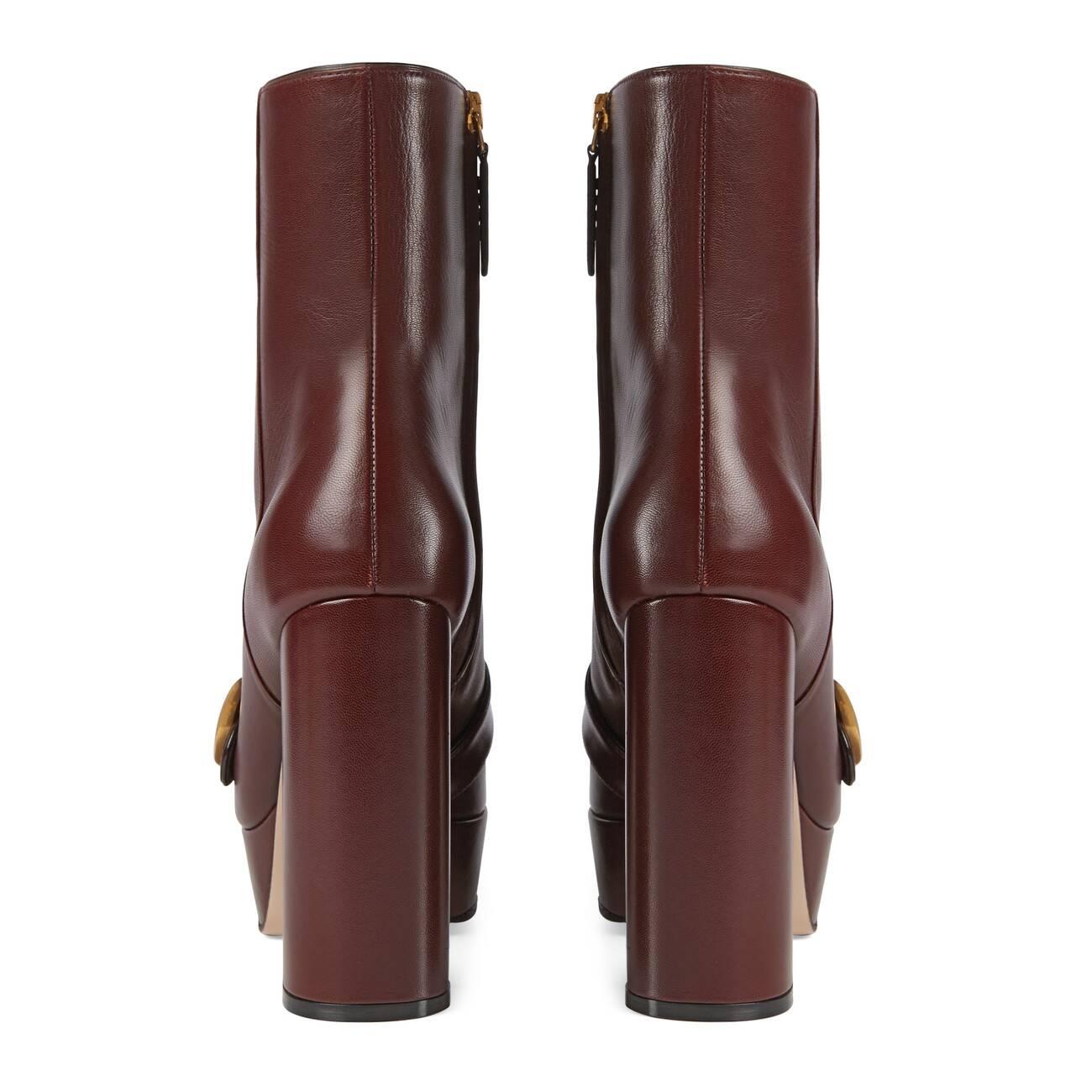 gucci leather platform ankle boot with fringe