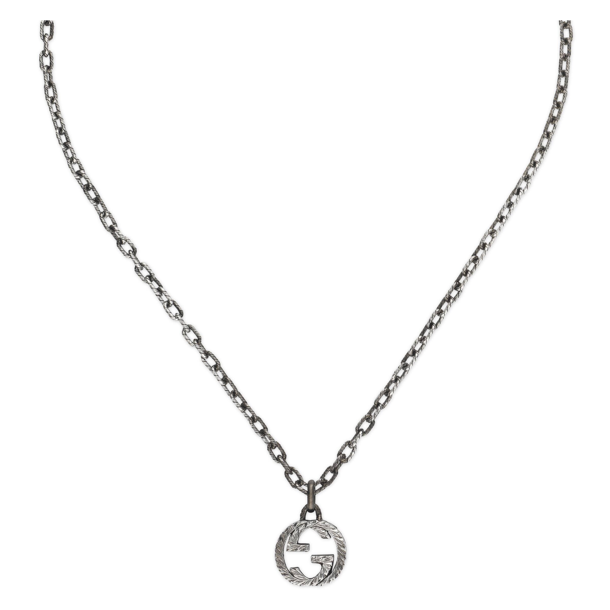 interlocking g pendant