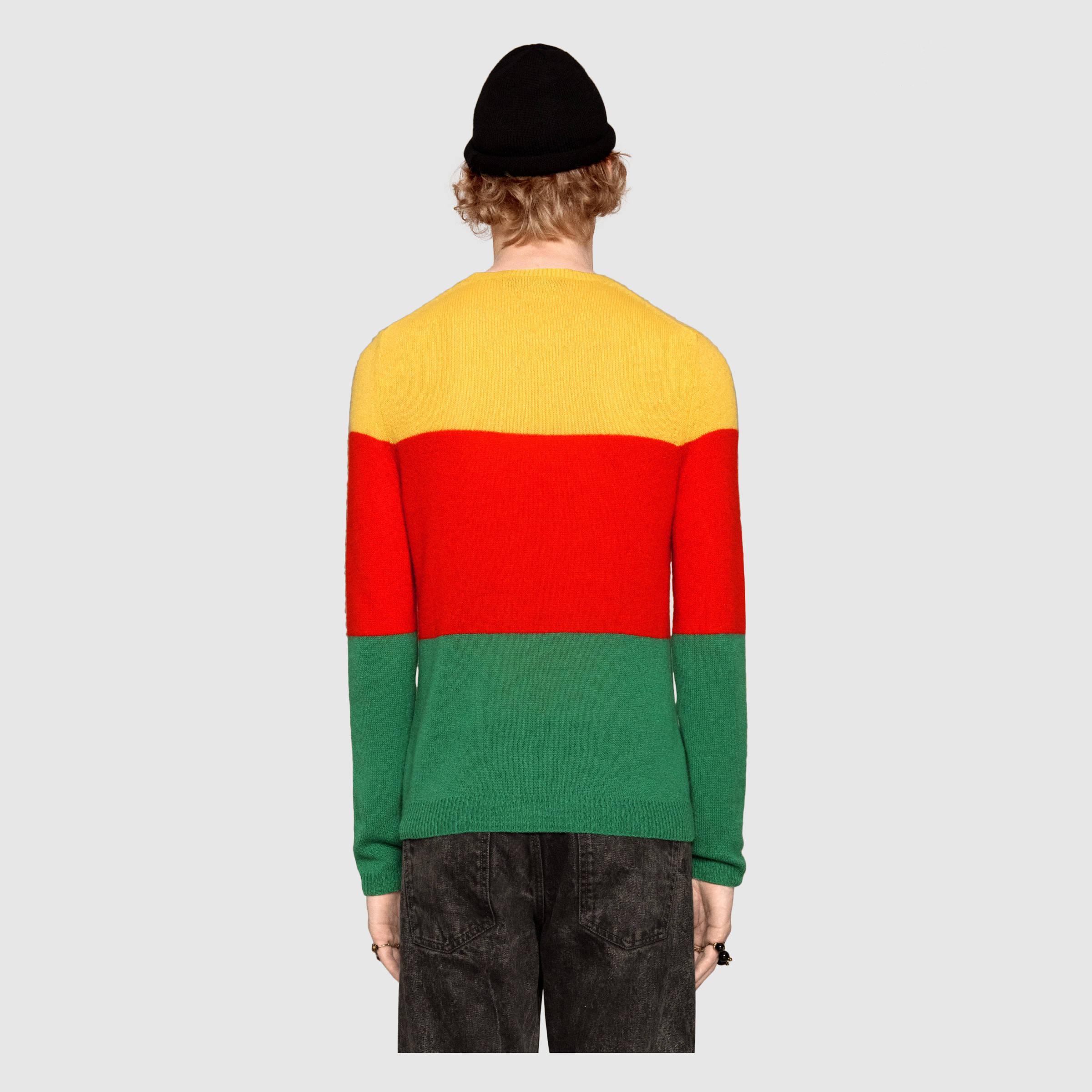 green and yellow sweater