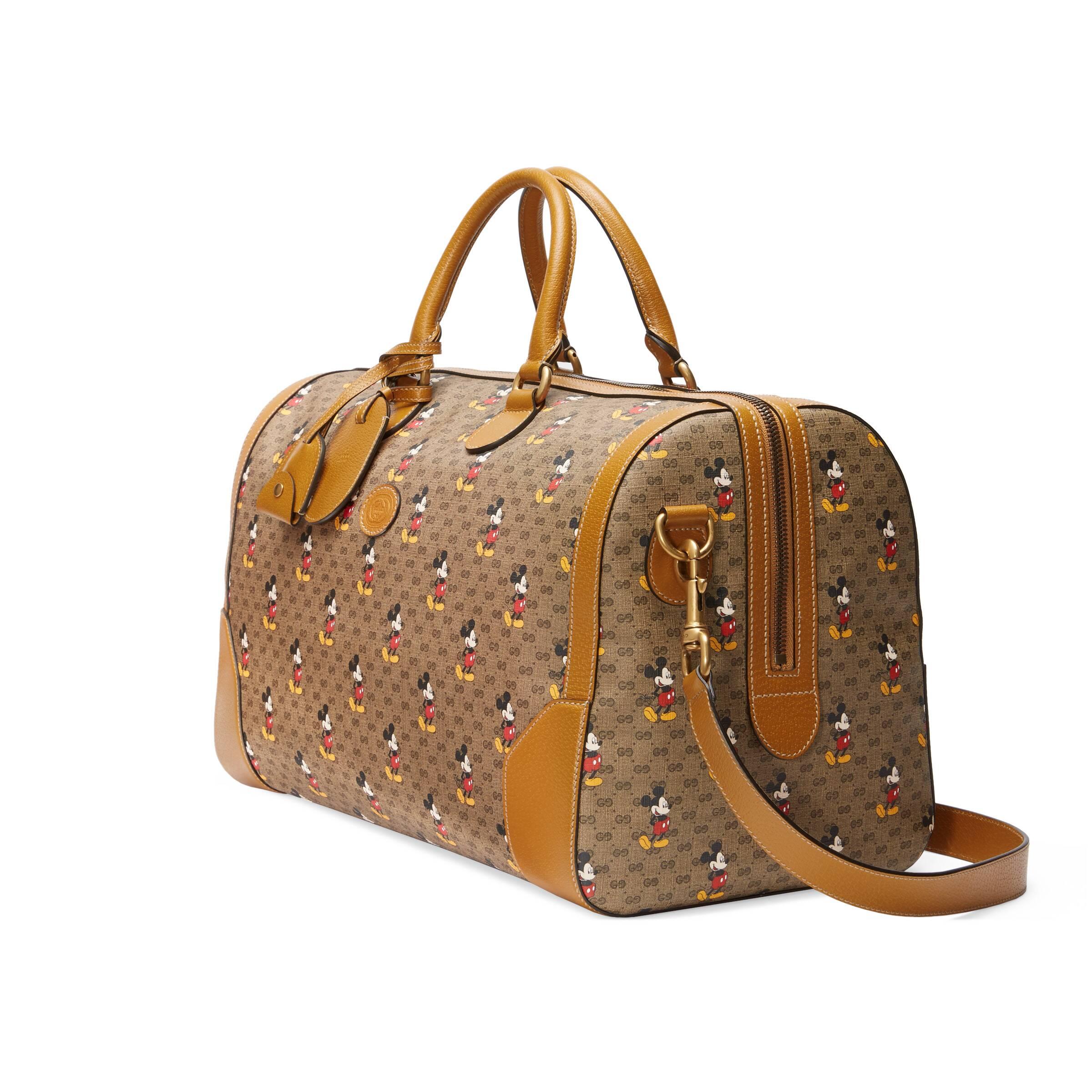 Gucci X Disney Mickey Mouse Monogram Duffel Travel Bag For Sale at 1stDibs   gucci mickey mouse duffle bag, gucci disney duffle bag, gucci mickey  mouse luggage