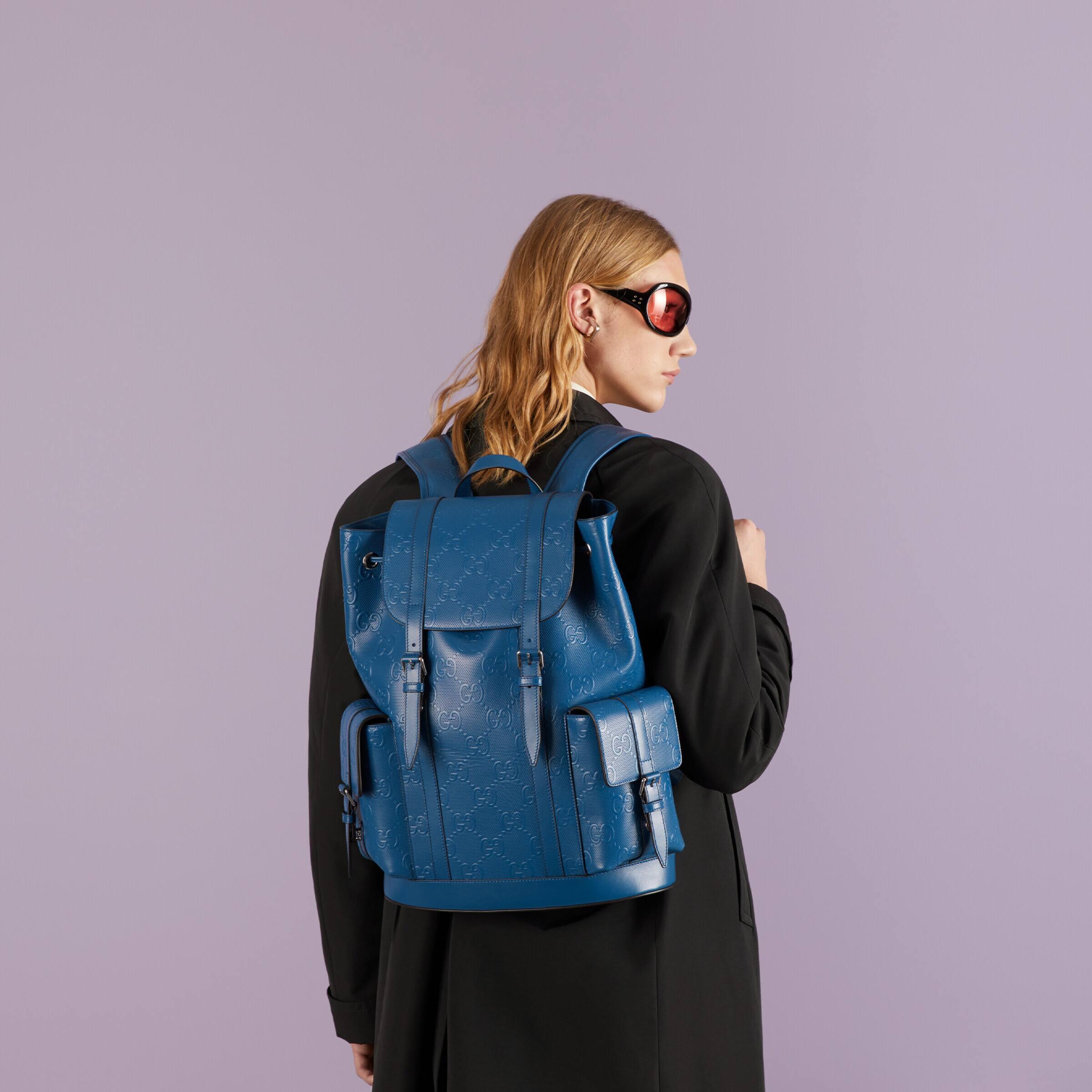Gucci GG Embossed Backpack in Blue for Men