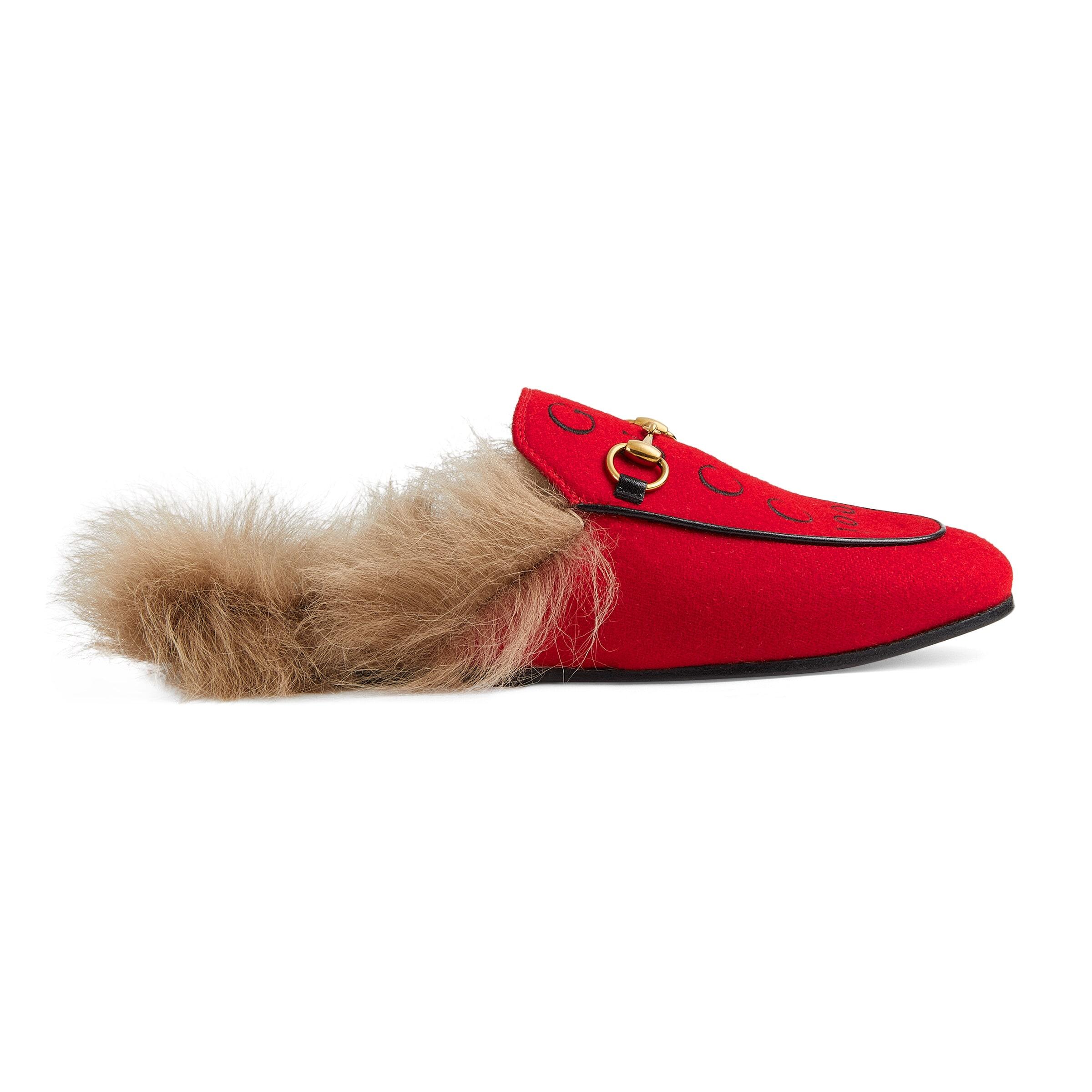 red gucci fur loafers