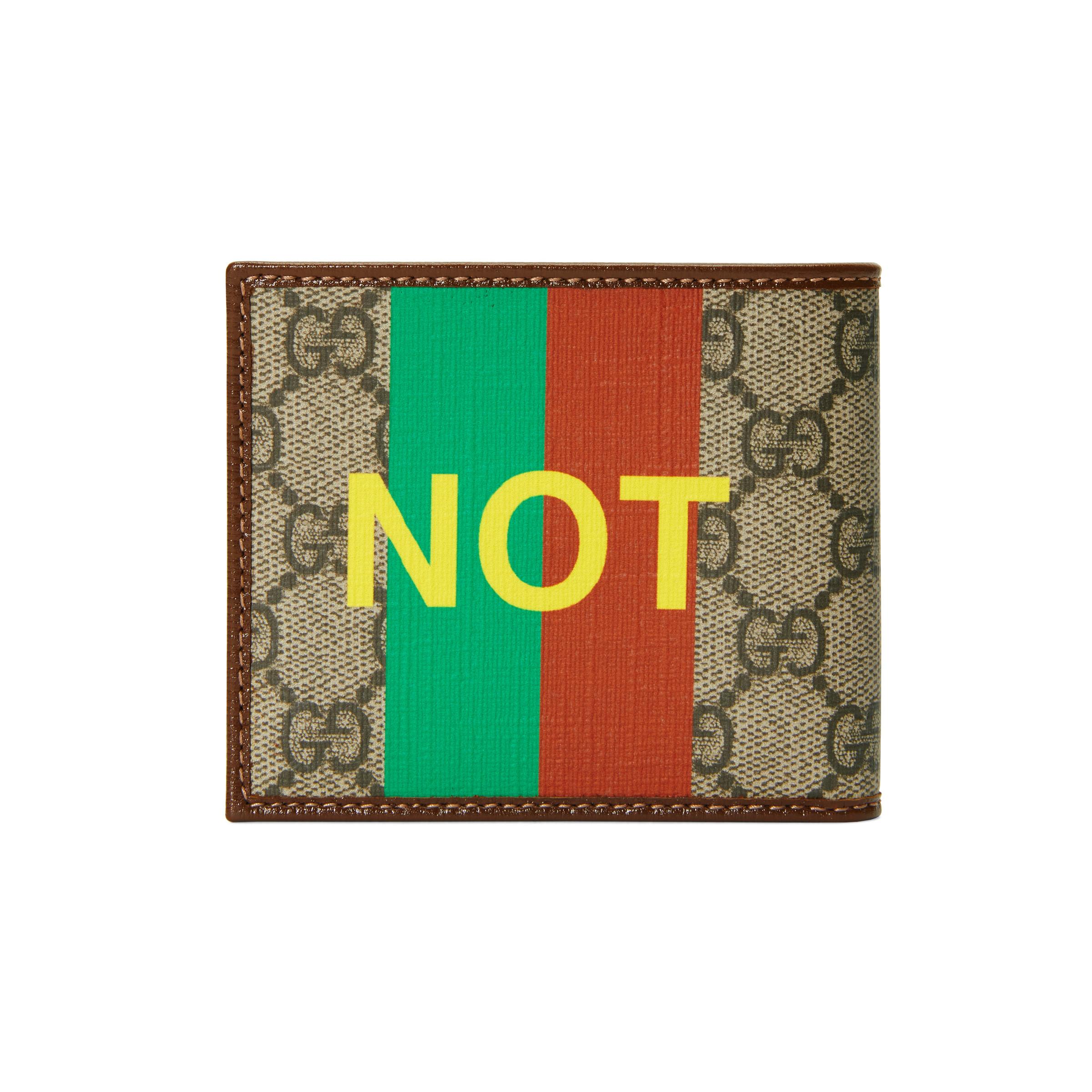 Portafoglio bi-fold con stampa 'Fake/Not' da Uomo di Gucci in Neutro | Lyst