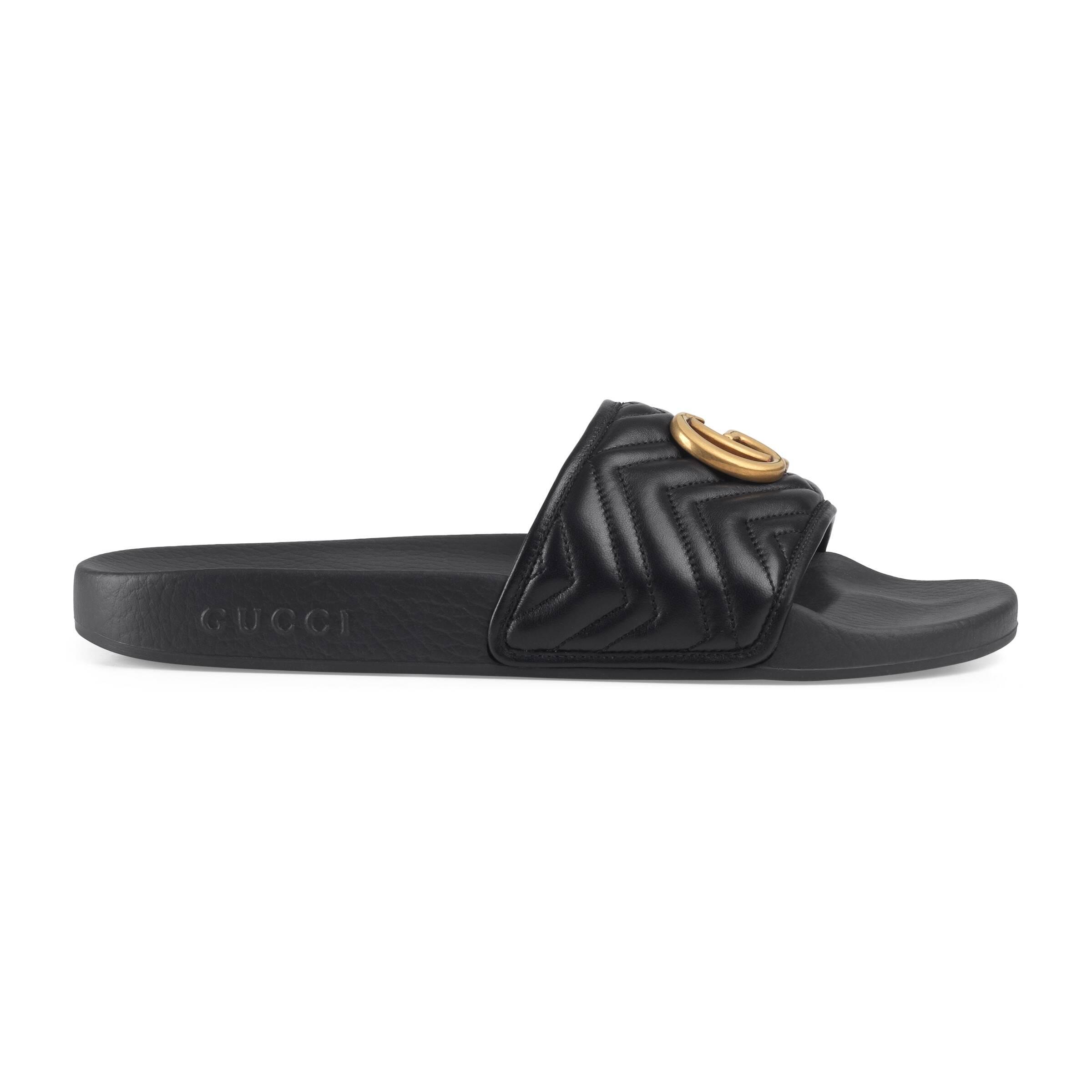 black leather gucci slides
