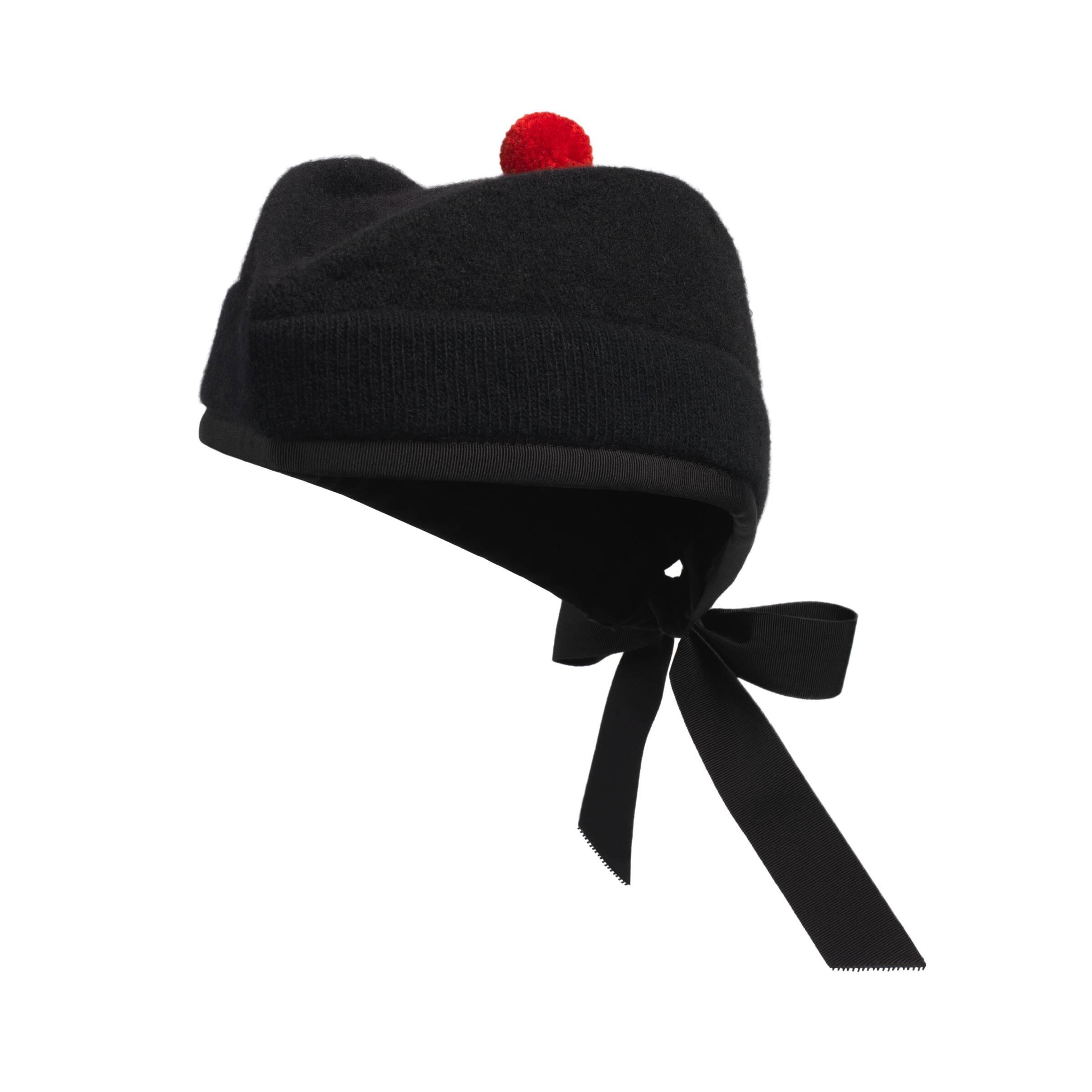 gucci hat with pom pom