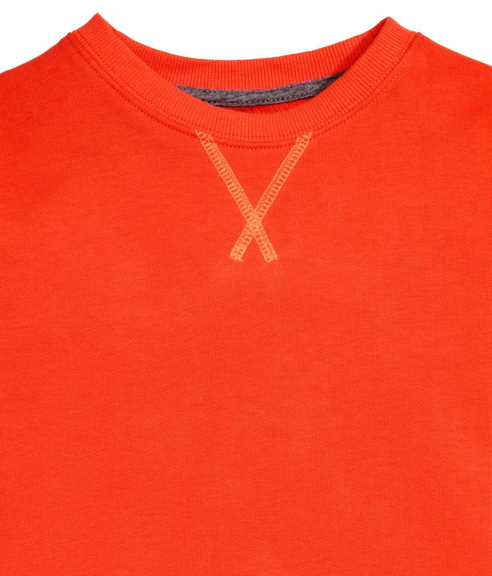 orange sweatshirt h&m