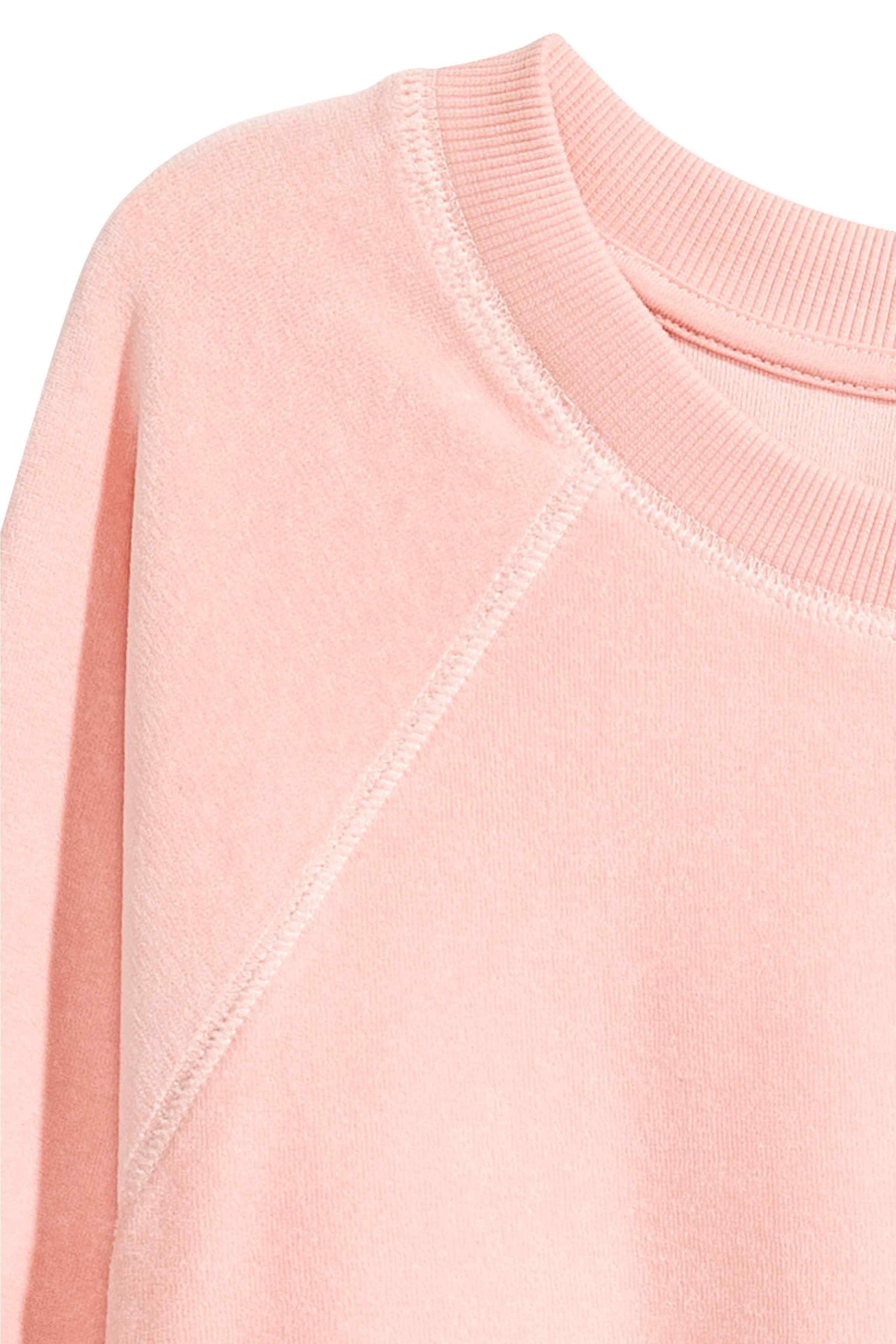 pink velour sweatshirt