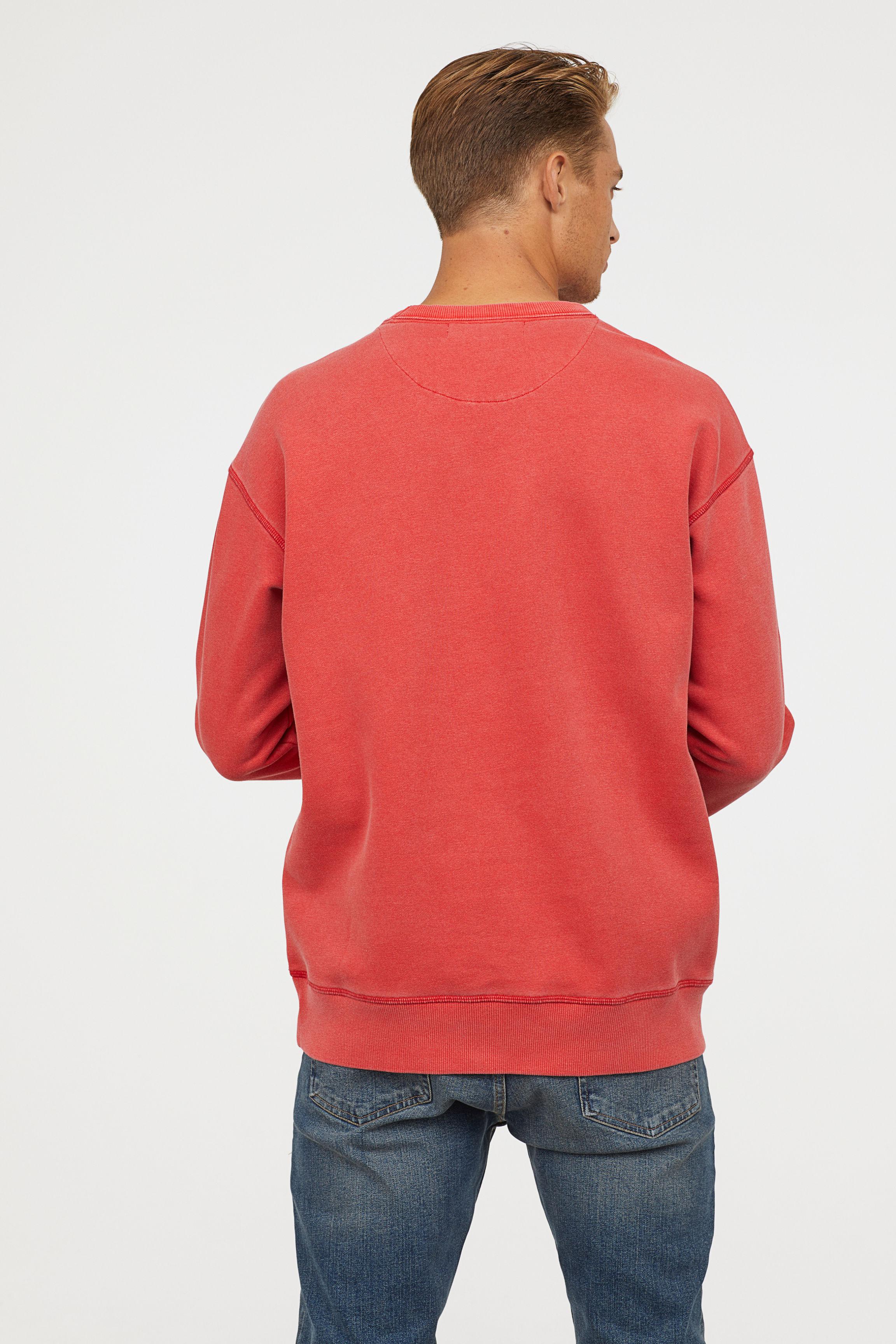 light red sweatshirt