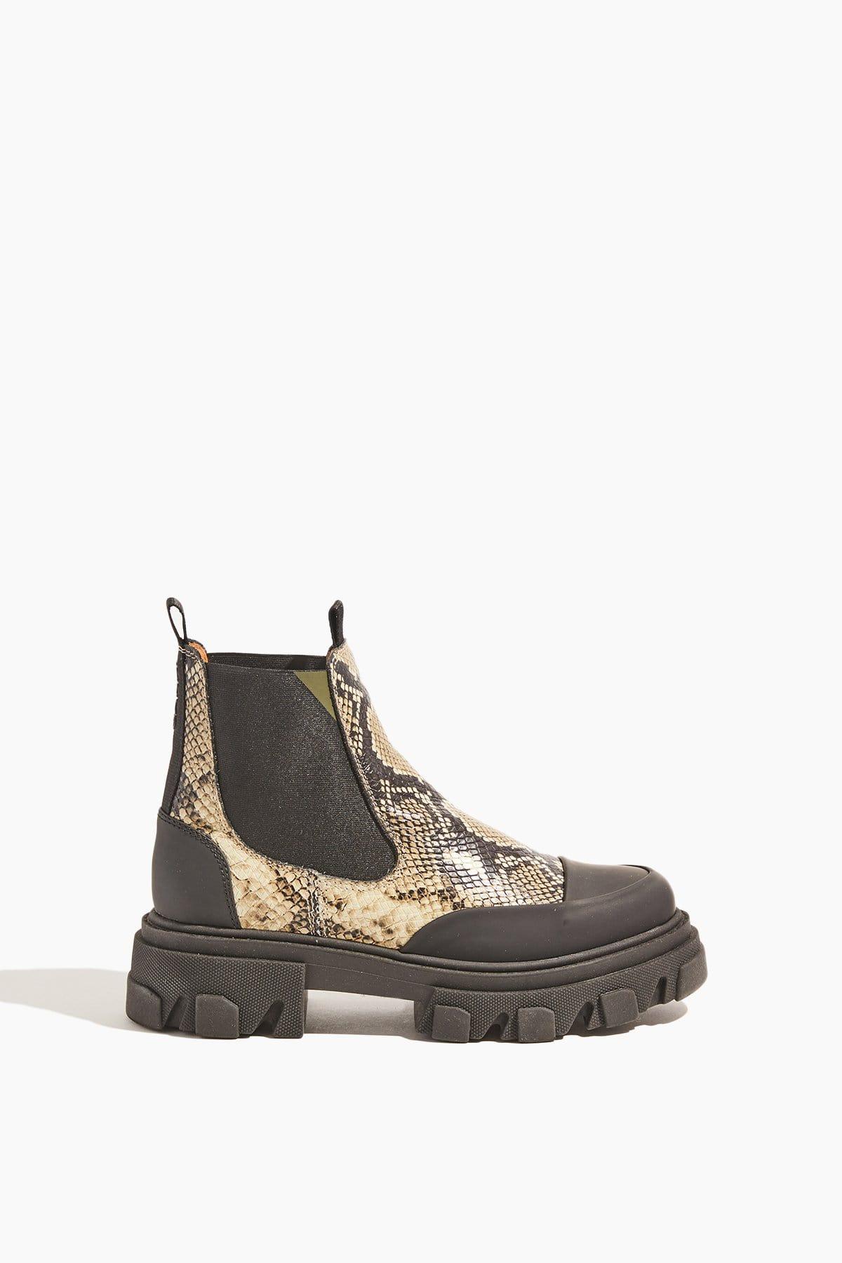snake embossed boots