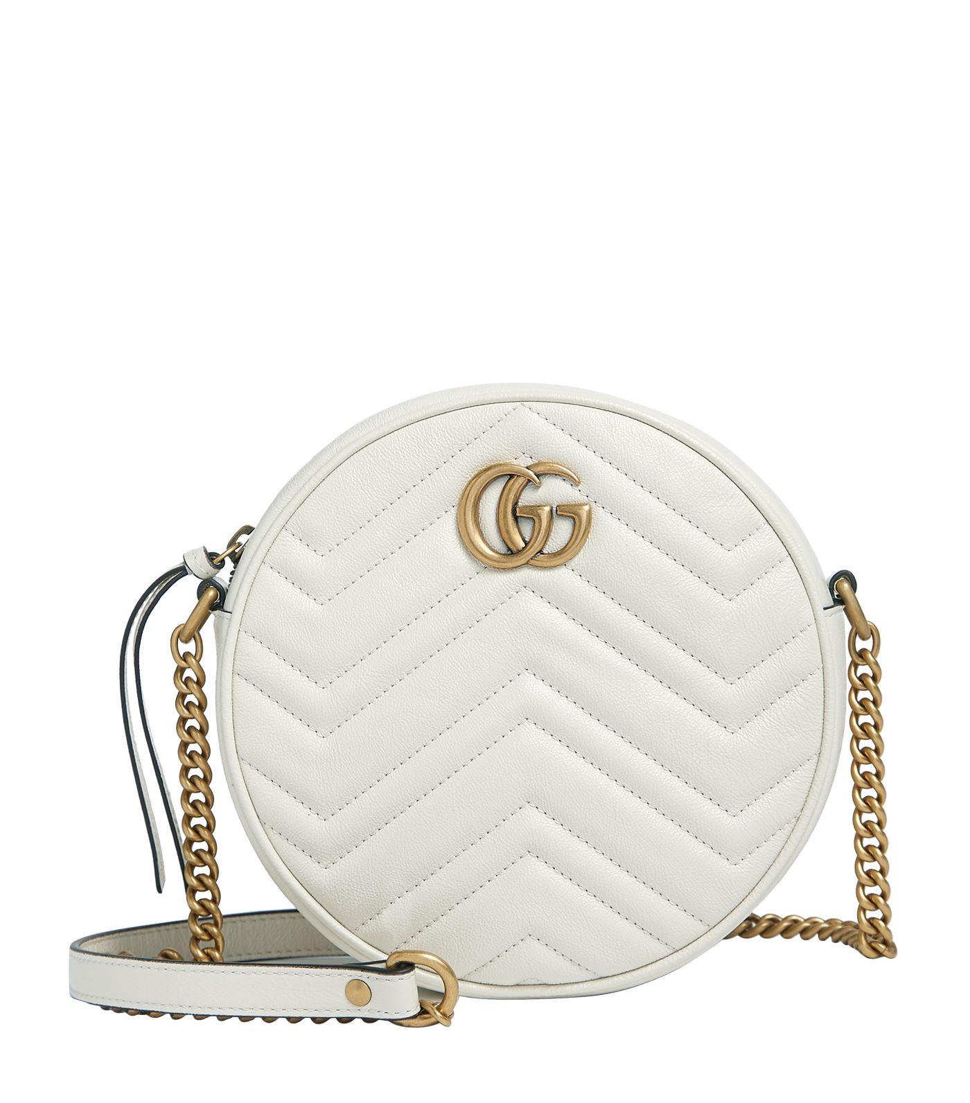 Gucci Leather Mini Round Marmont Matelass Shoulder Bag in Red - Lyst