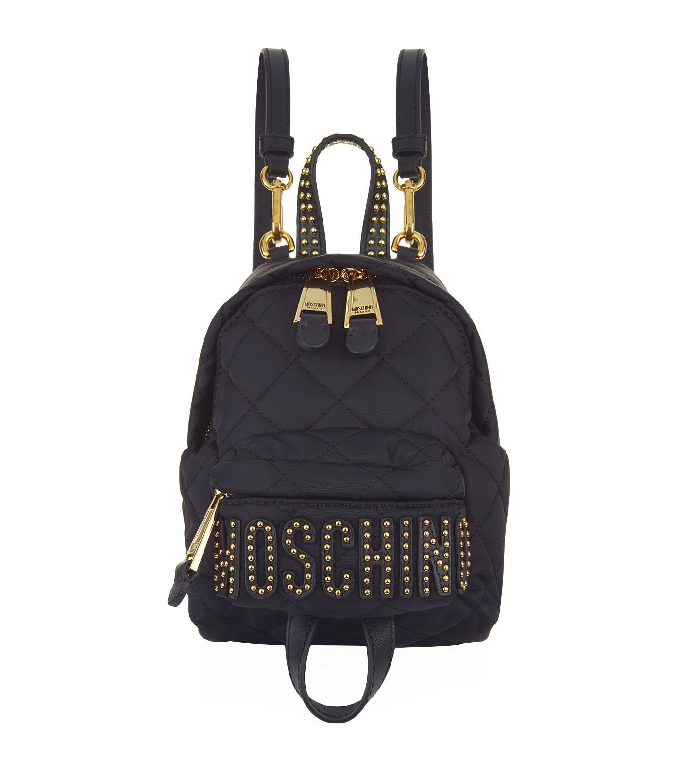 Neerduwen kralen nevel Moschino Mini Quilted Stud Logo Backpack in Black | Lyst
