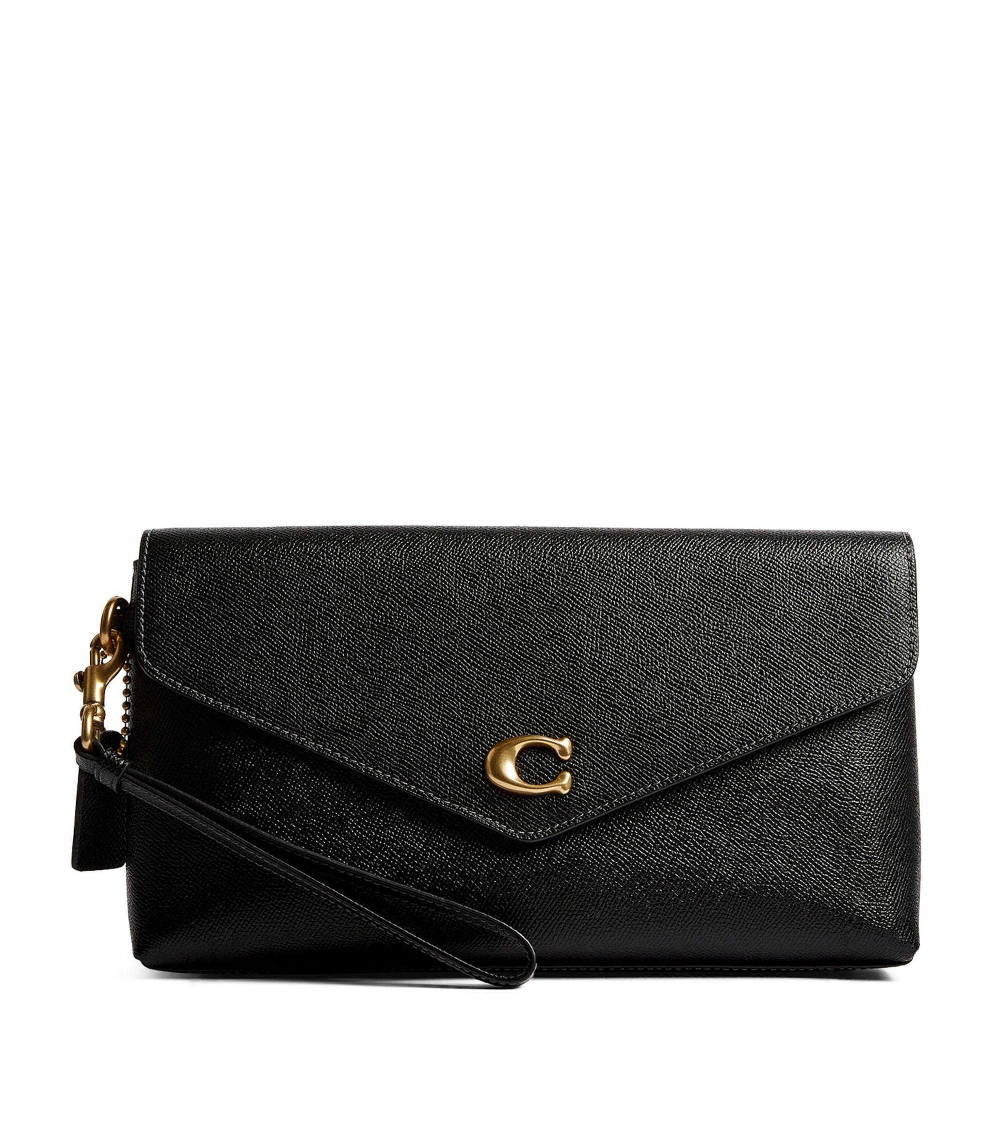 COACH Leather Wyn Clutch Bag in Black | Lyst UK