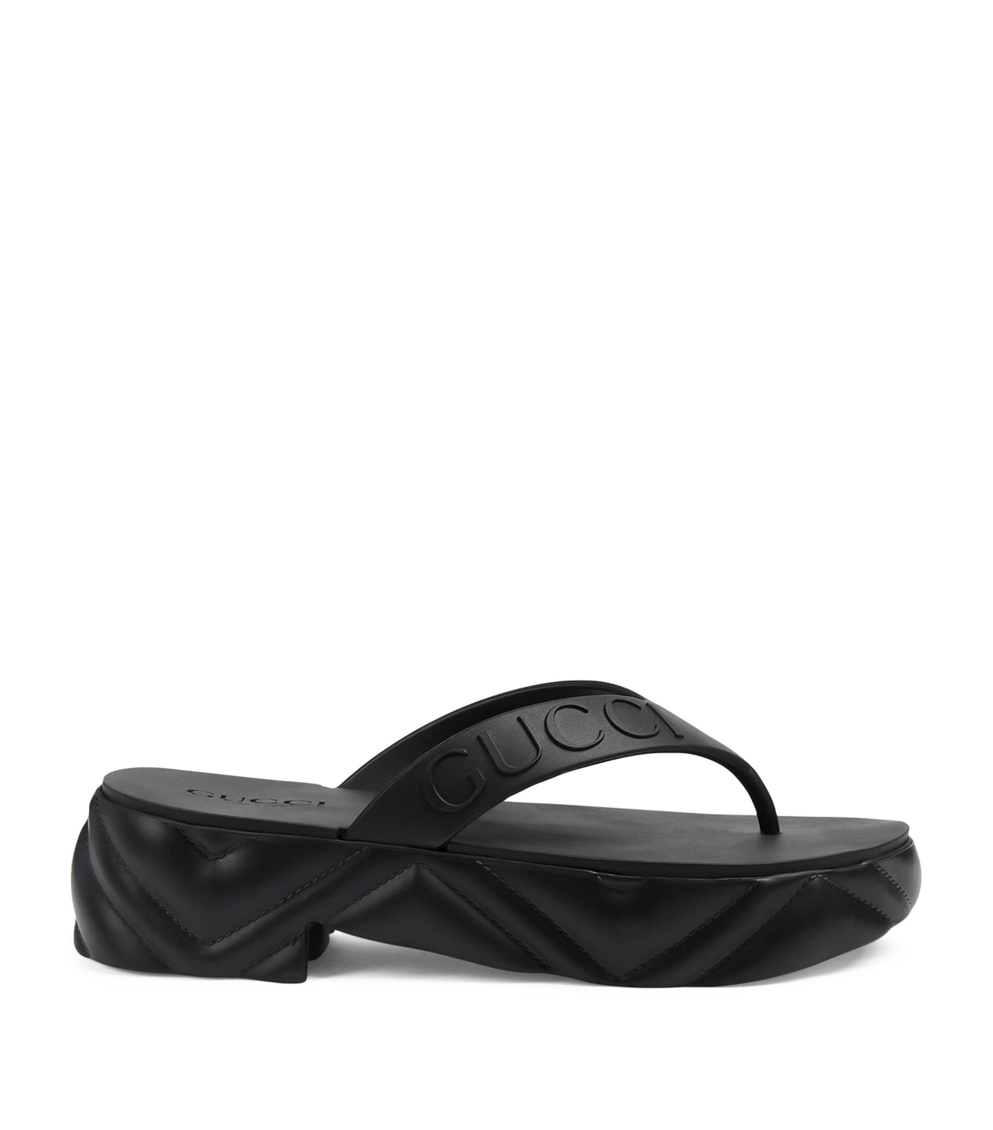Gucci logo rubber slide sandal black best sale