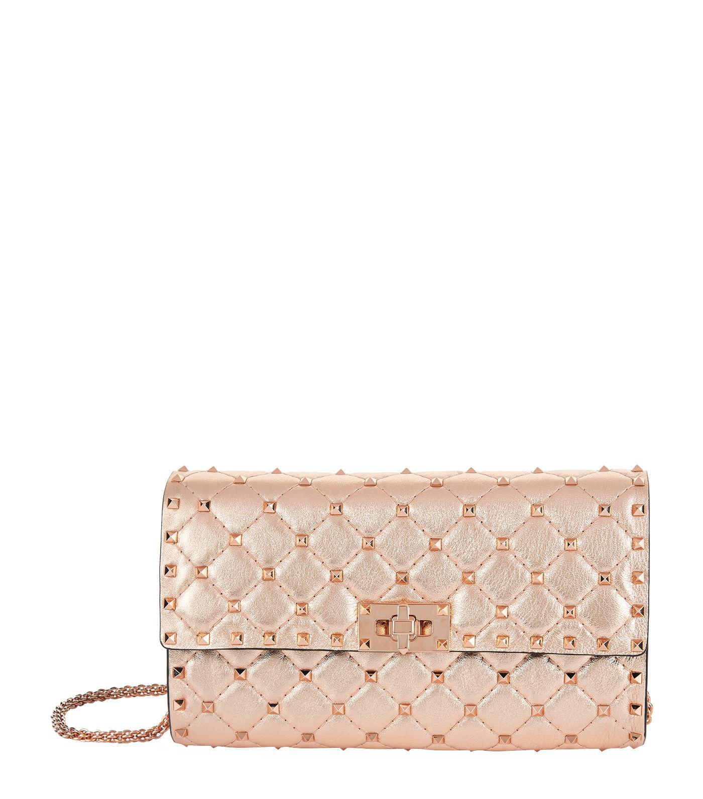 pink and gold clutch