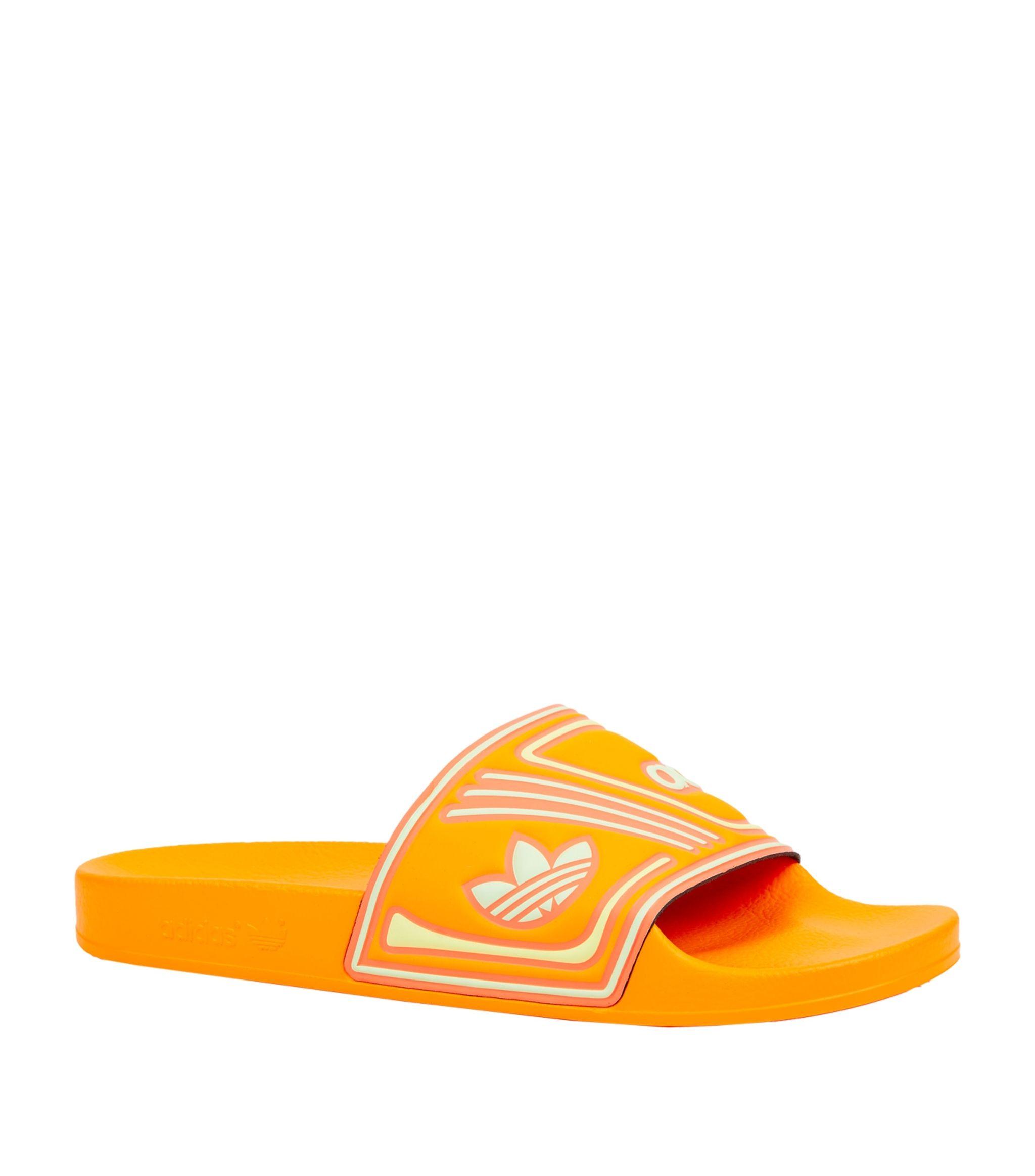 adilette slides orange