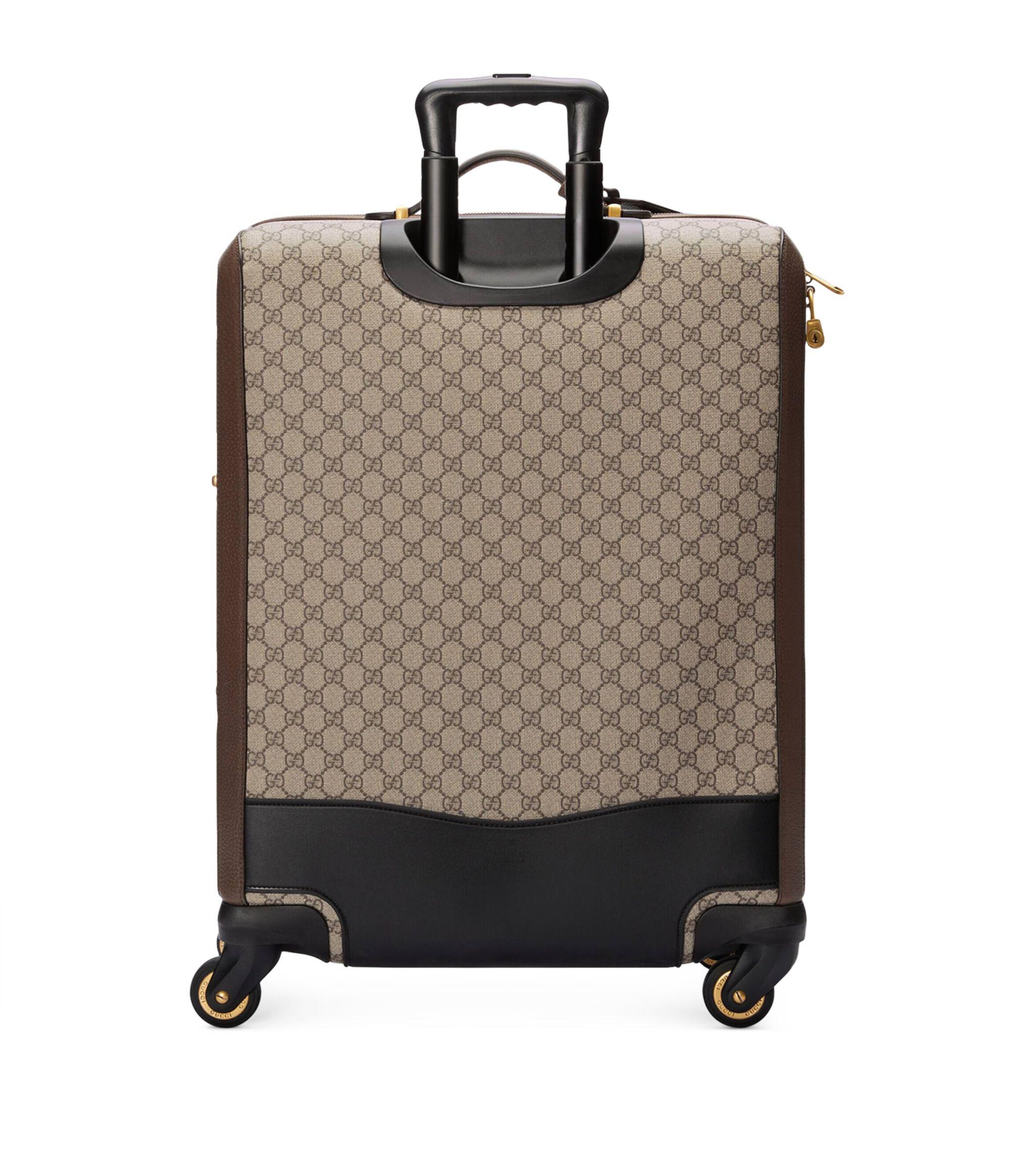 Gucci carry hotsell on suitcase