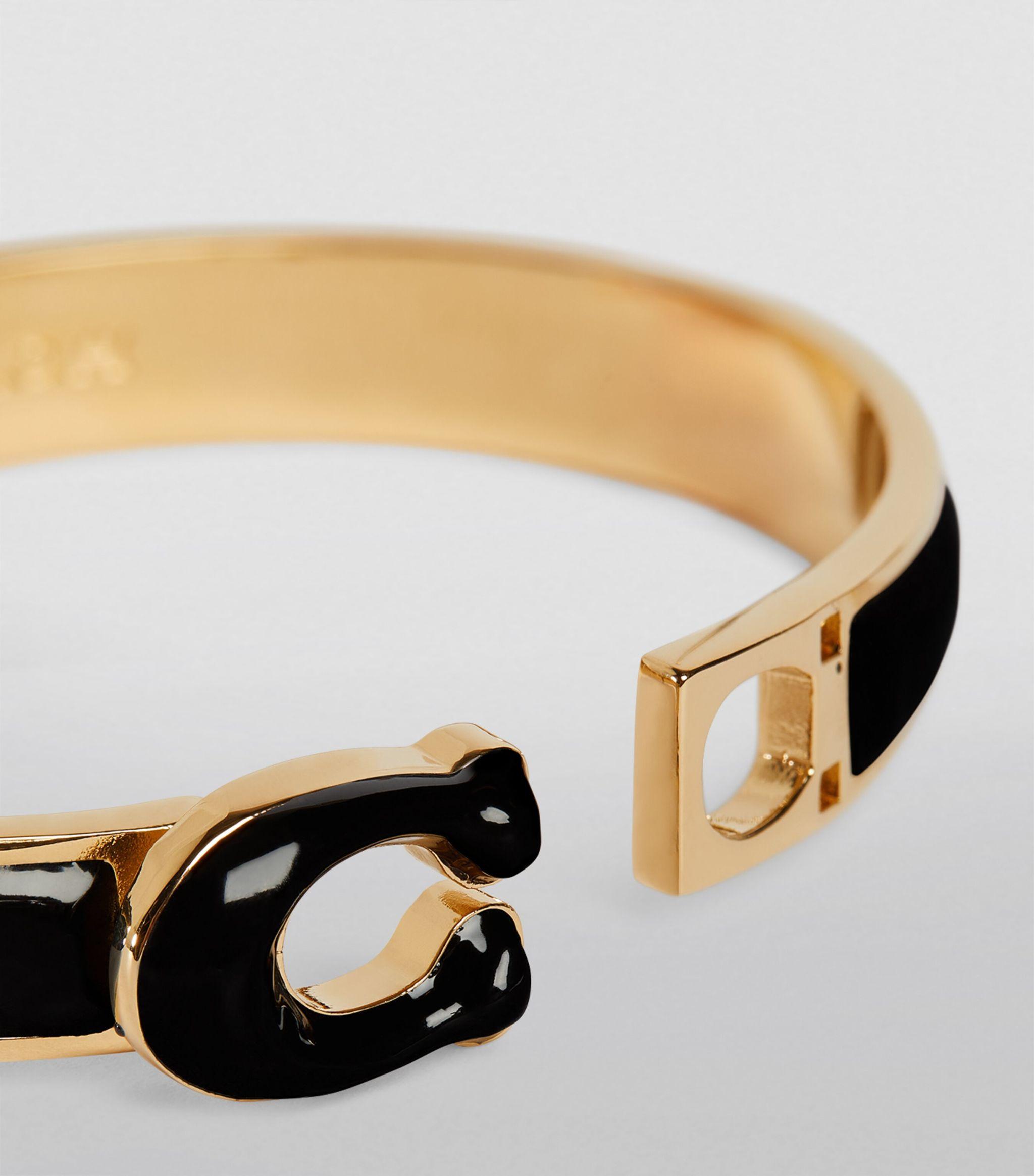 Coach Tabby Enamel Hinged Bangle Bracelet - Women's Bracelets - Gold/Black