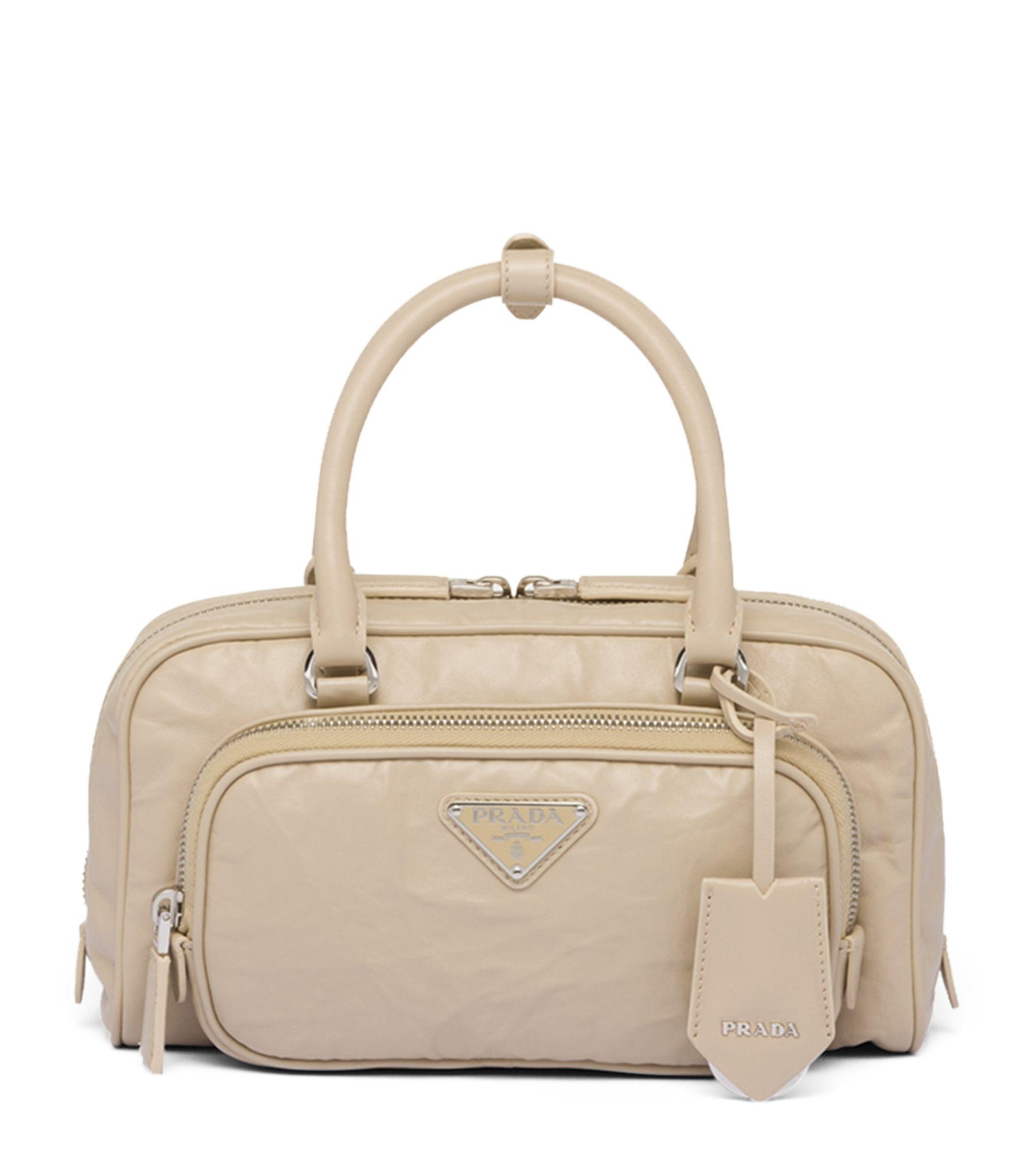 Prada bag with lock and key sale