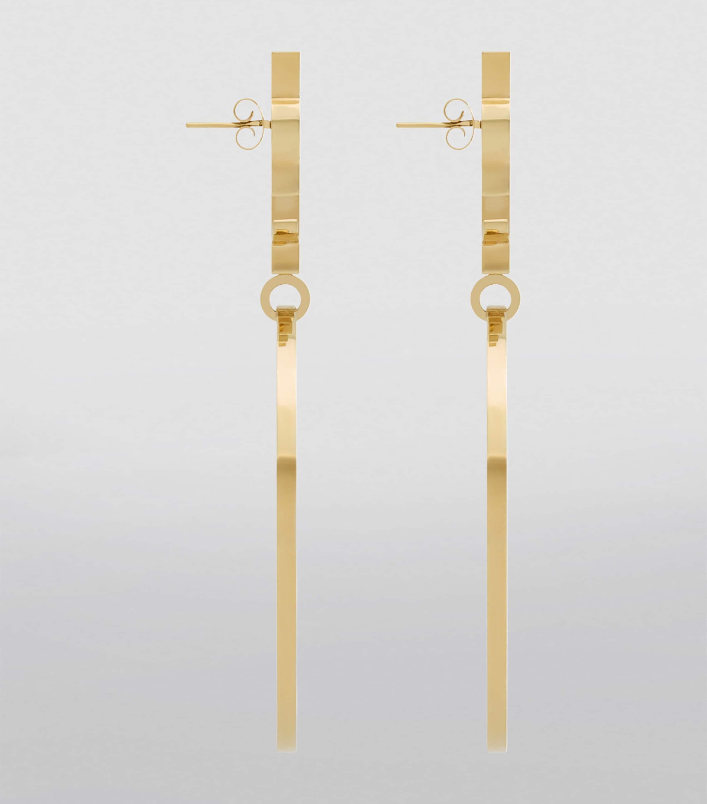 Saint Laurent Cassandre Pendant Hoop Earrings in Metallic Lyst UK