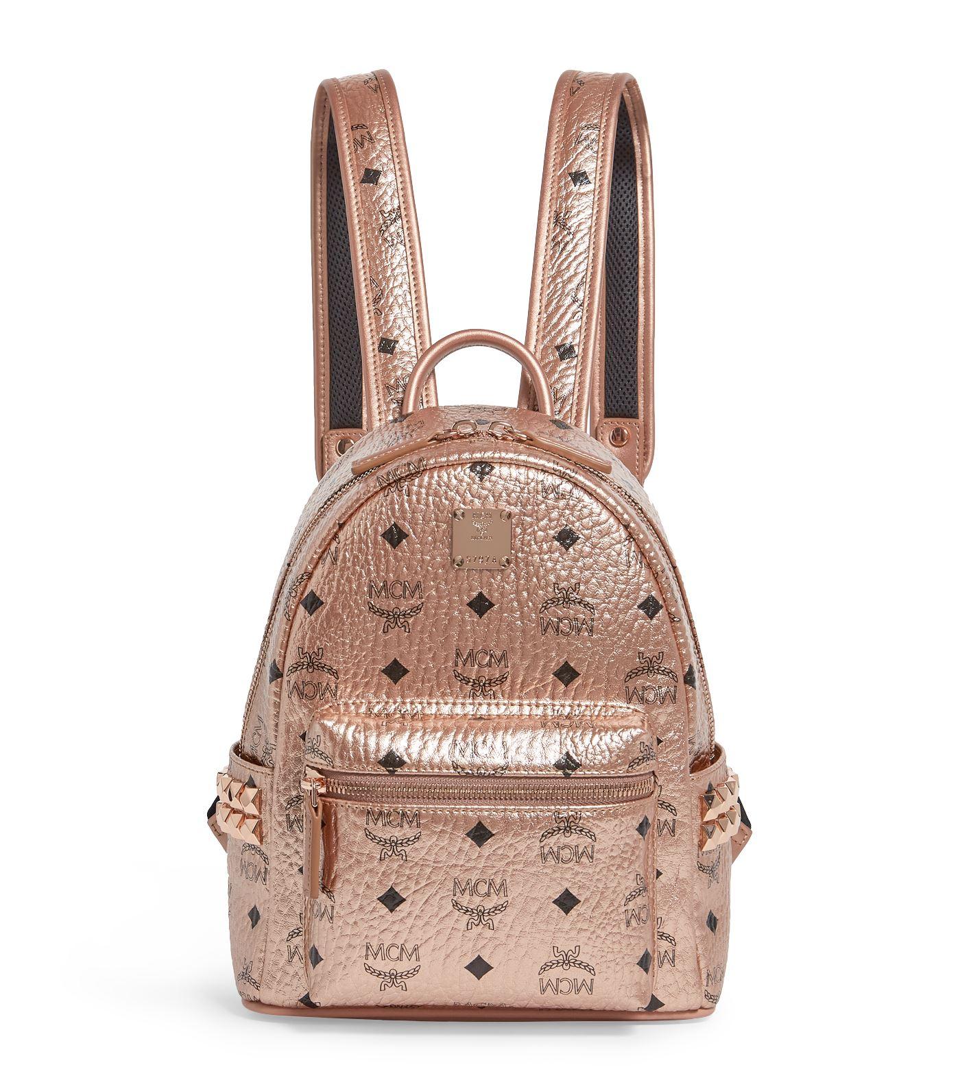 MCM Champagne Gold Mini Stark Backpack at FORZIERI
