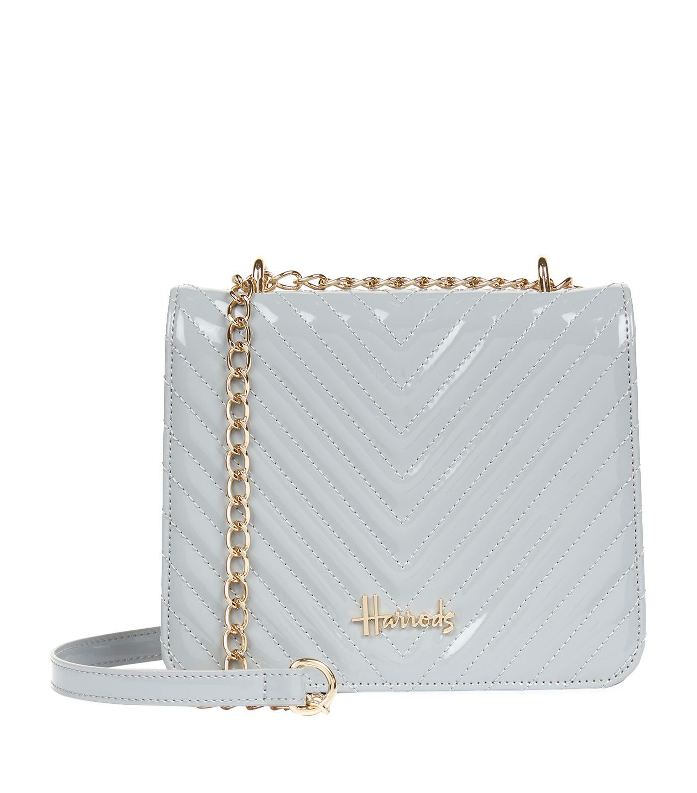 grey patent bag