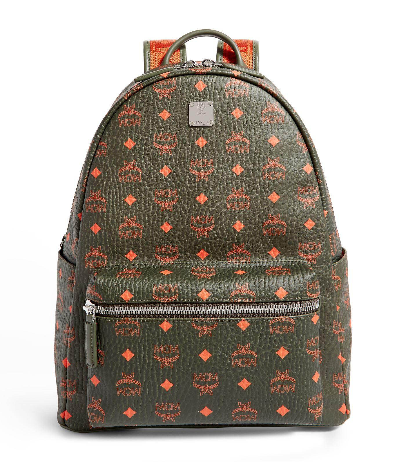 green mcm backpack